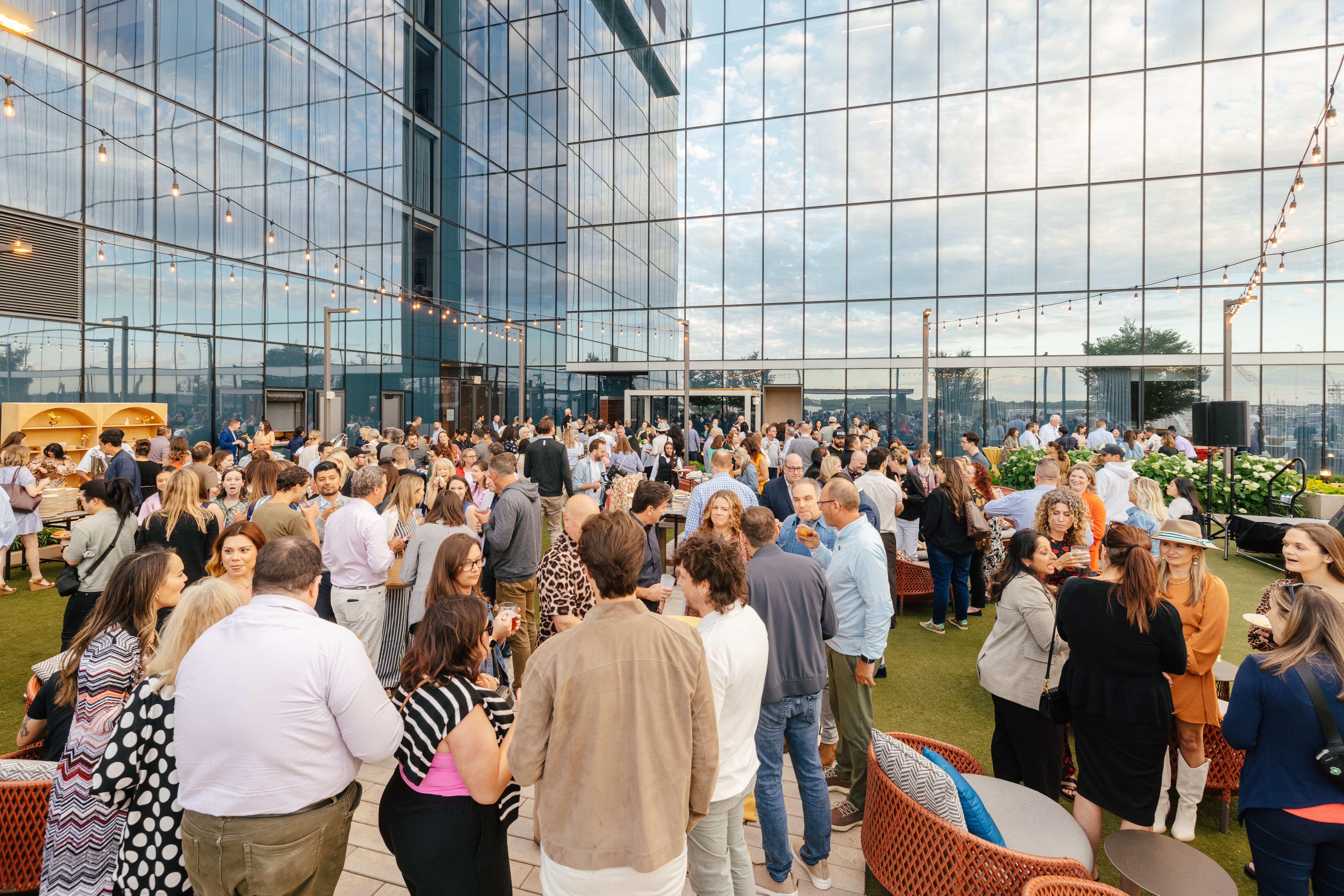 The Summit attendees on the rooftop of The Four Seasons for a cocktail reception
