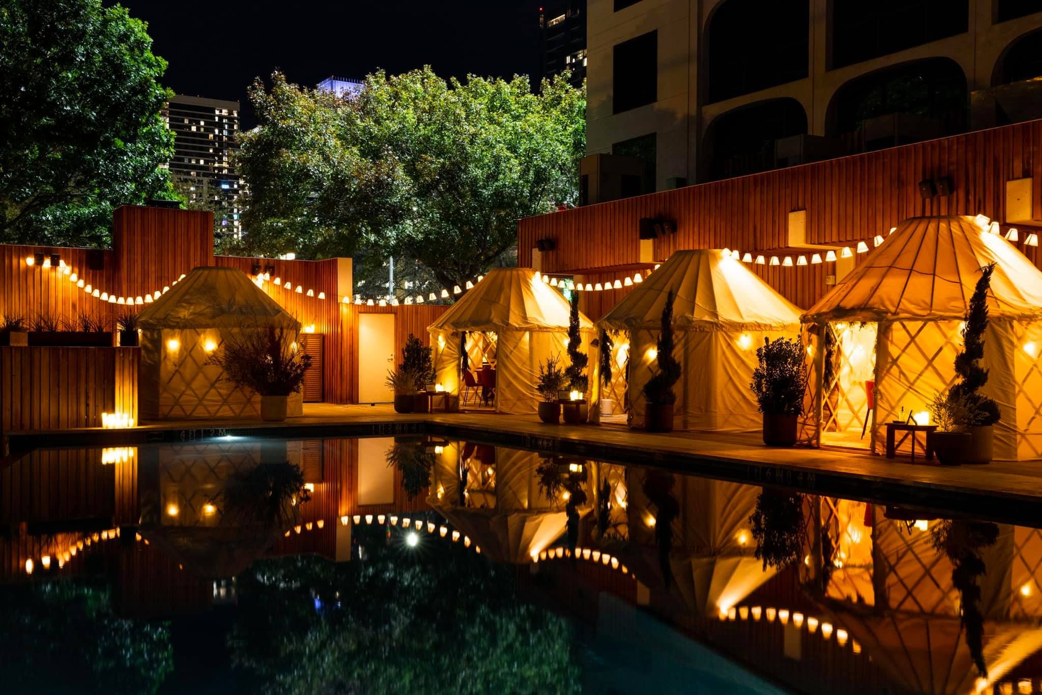 Yurts lined up at night