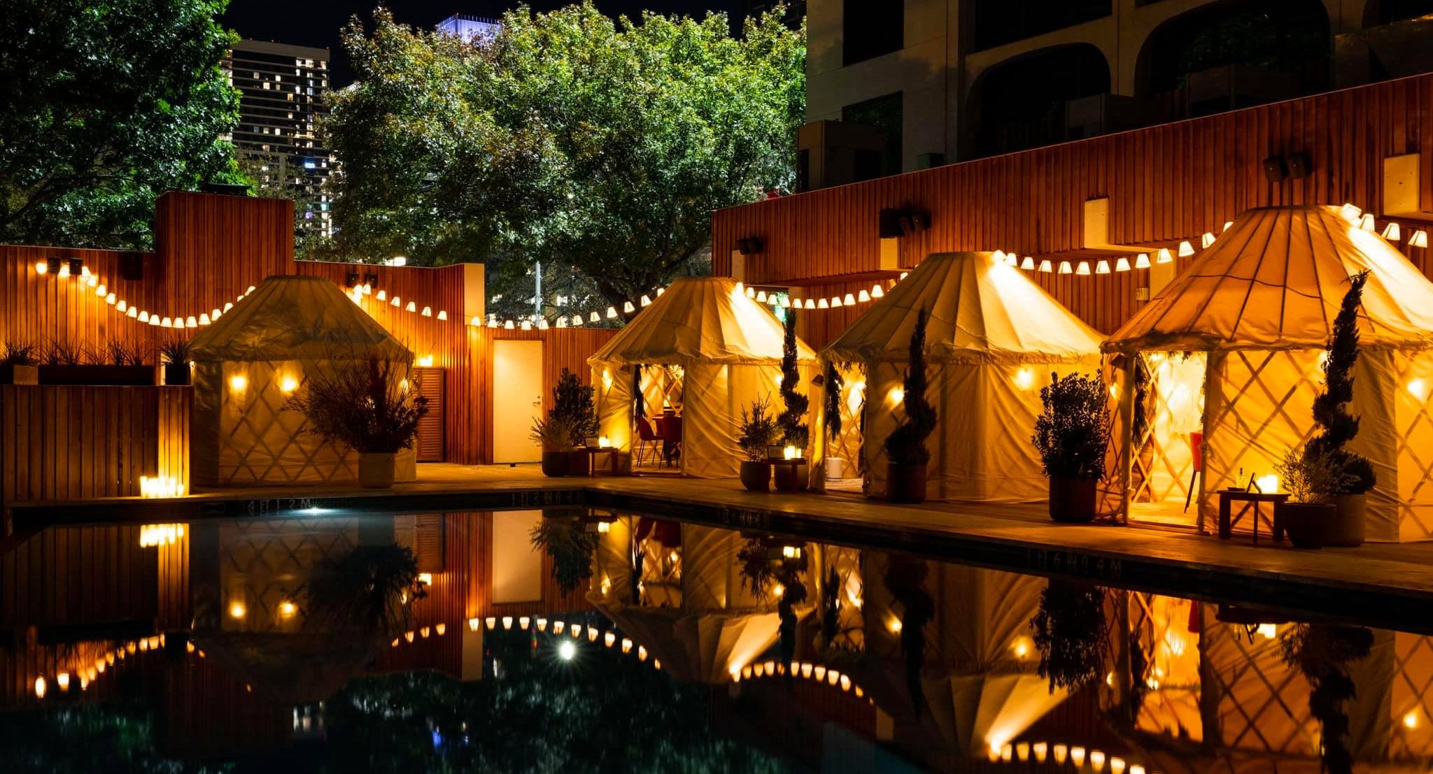 Yurts lined up at night