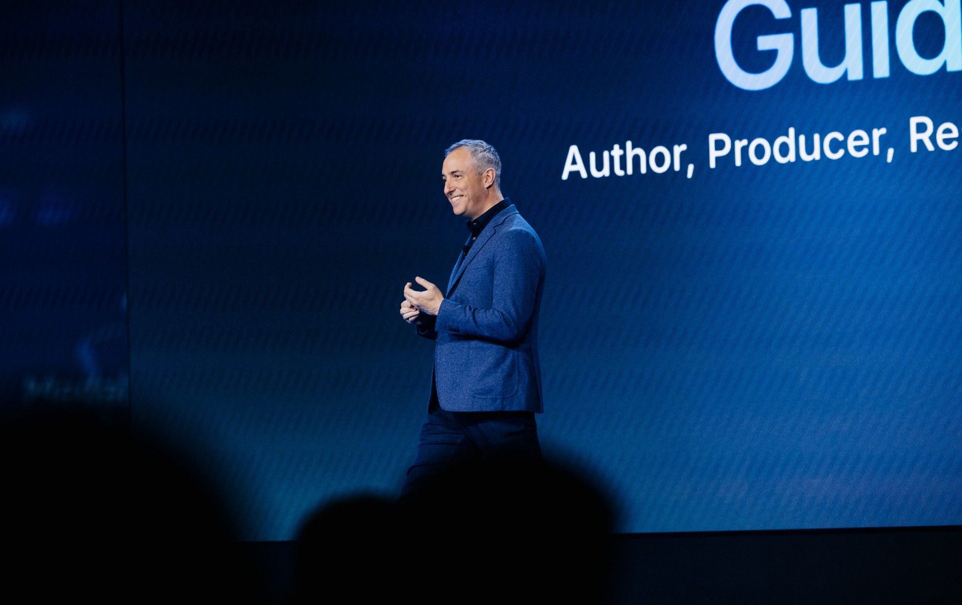 Will Guidara onstage delivering a keynote