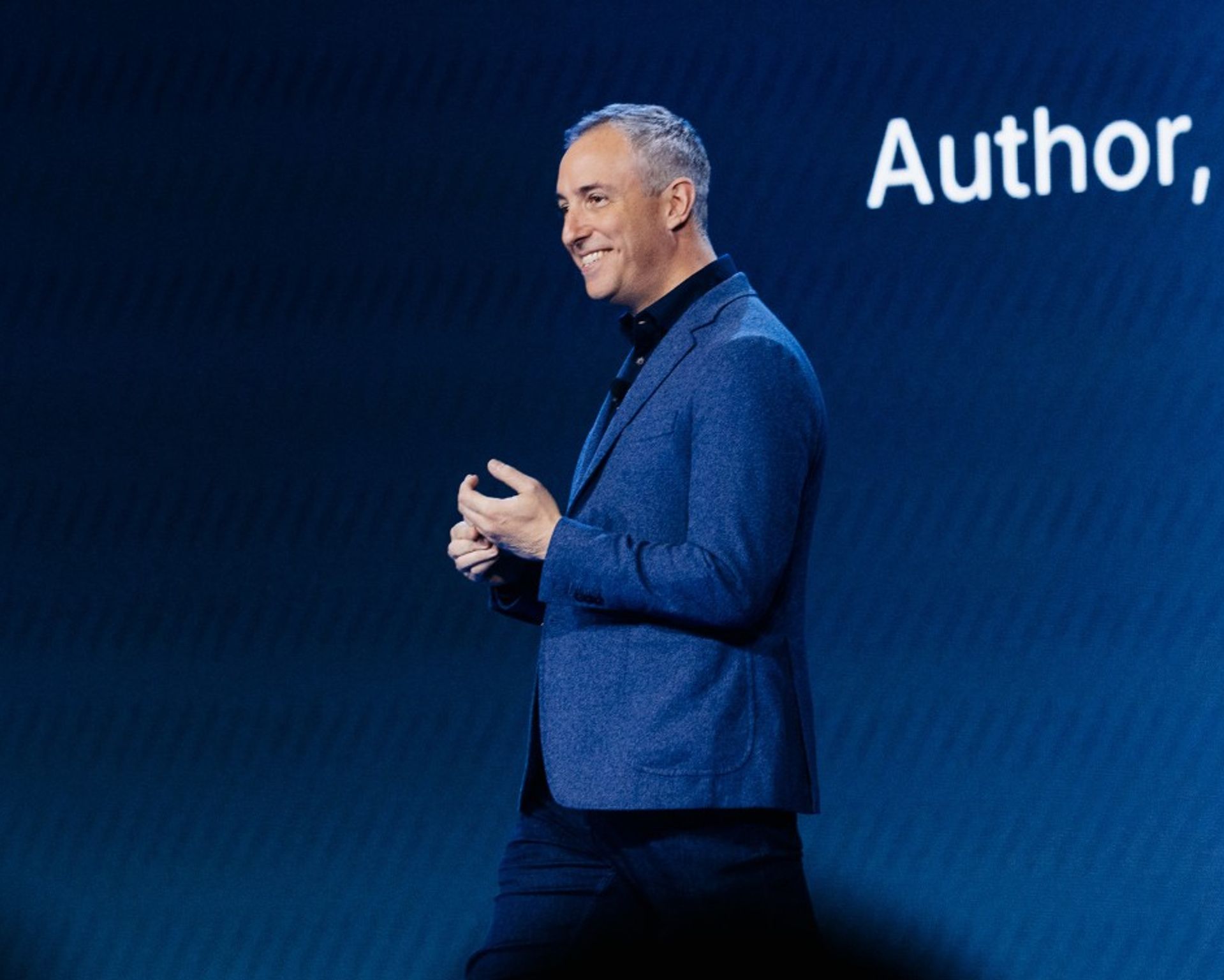 Will Guidara onstage delivering a keynote