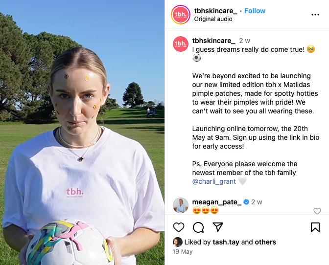 A woman holding a soccer ball standing next to an advertisement for tbh Skincare's limited edition Matildas Pimple Patch, symbolizing their collaboration with the Australian national women's football team, the Matildas.