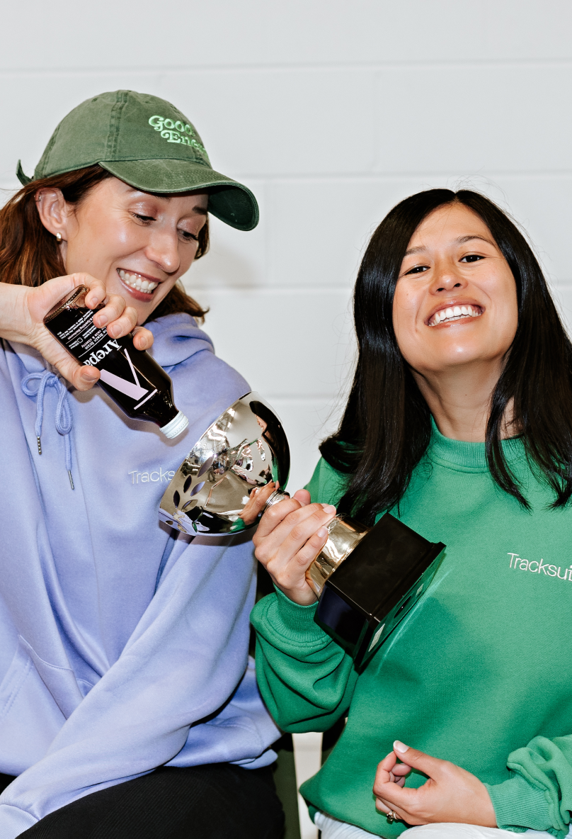 Tracksuit team members celebrating