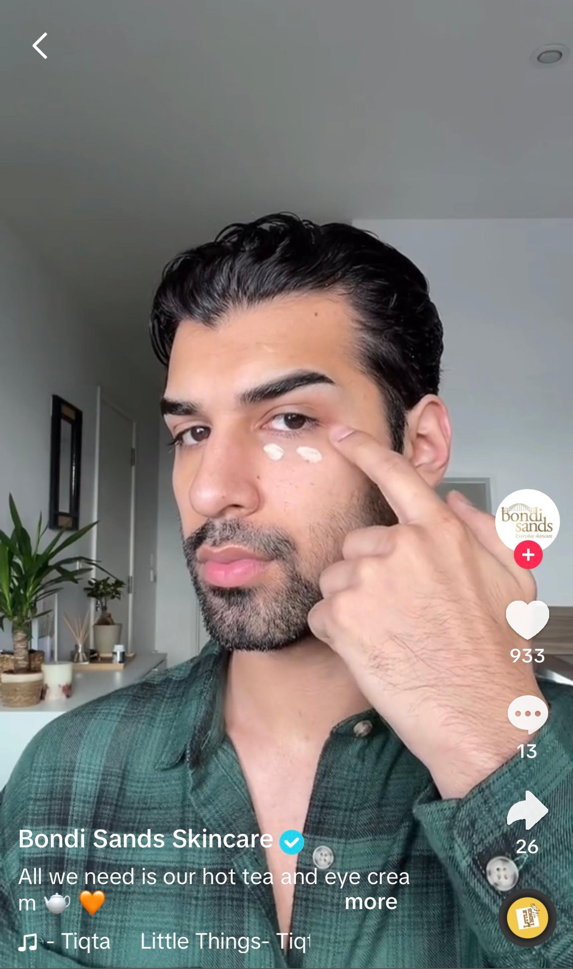 A man applying a skincare product from Bondi Sands, a leading Australian brand known for its self-tan, suncare, and skincare products that embody the Australian beach lifestyle.