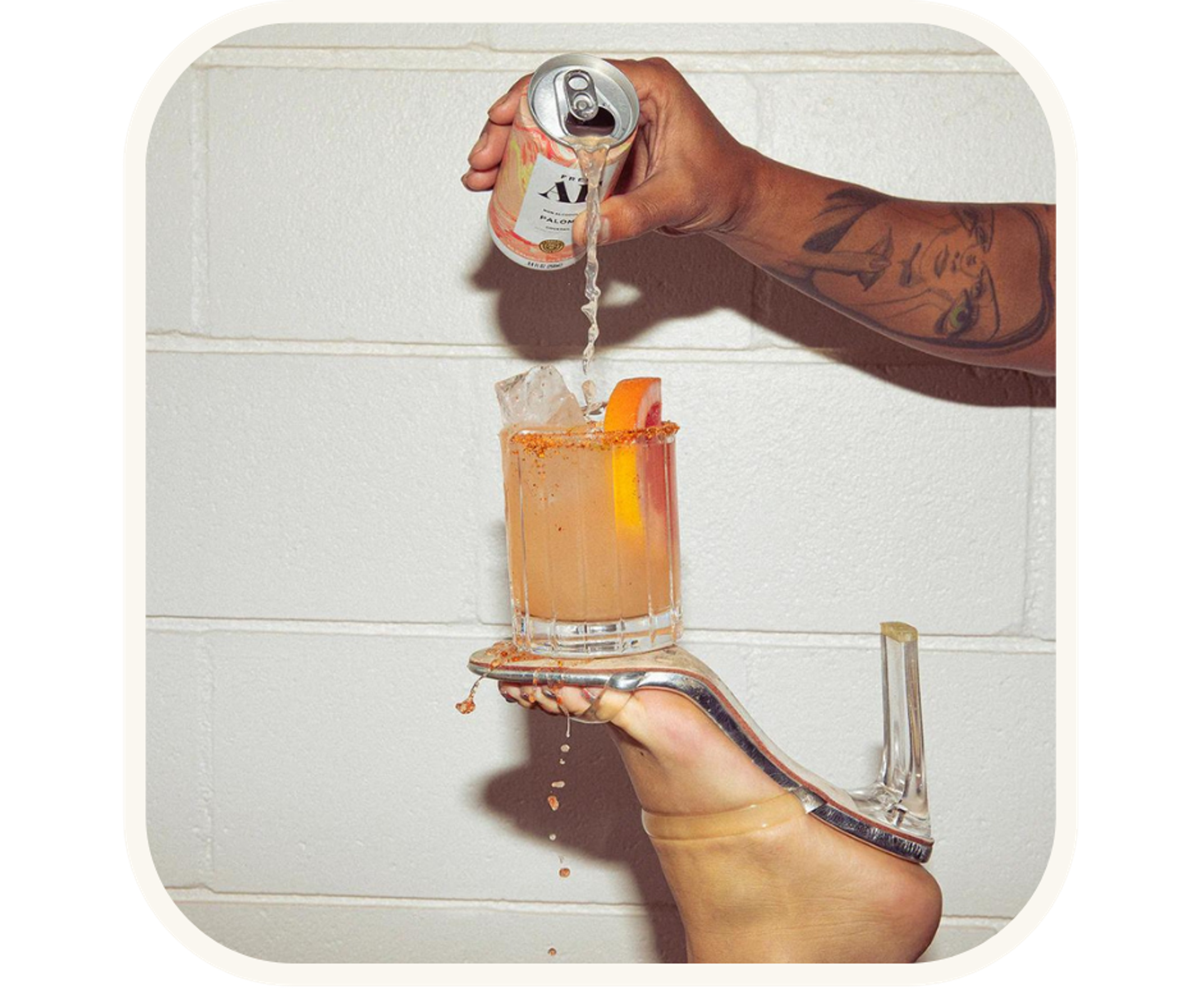 A person pouring a non-alcoholic beverage from a can into a glass, symbolizing the growing trend of alcohol-free drinks