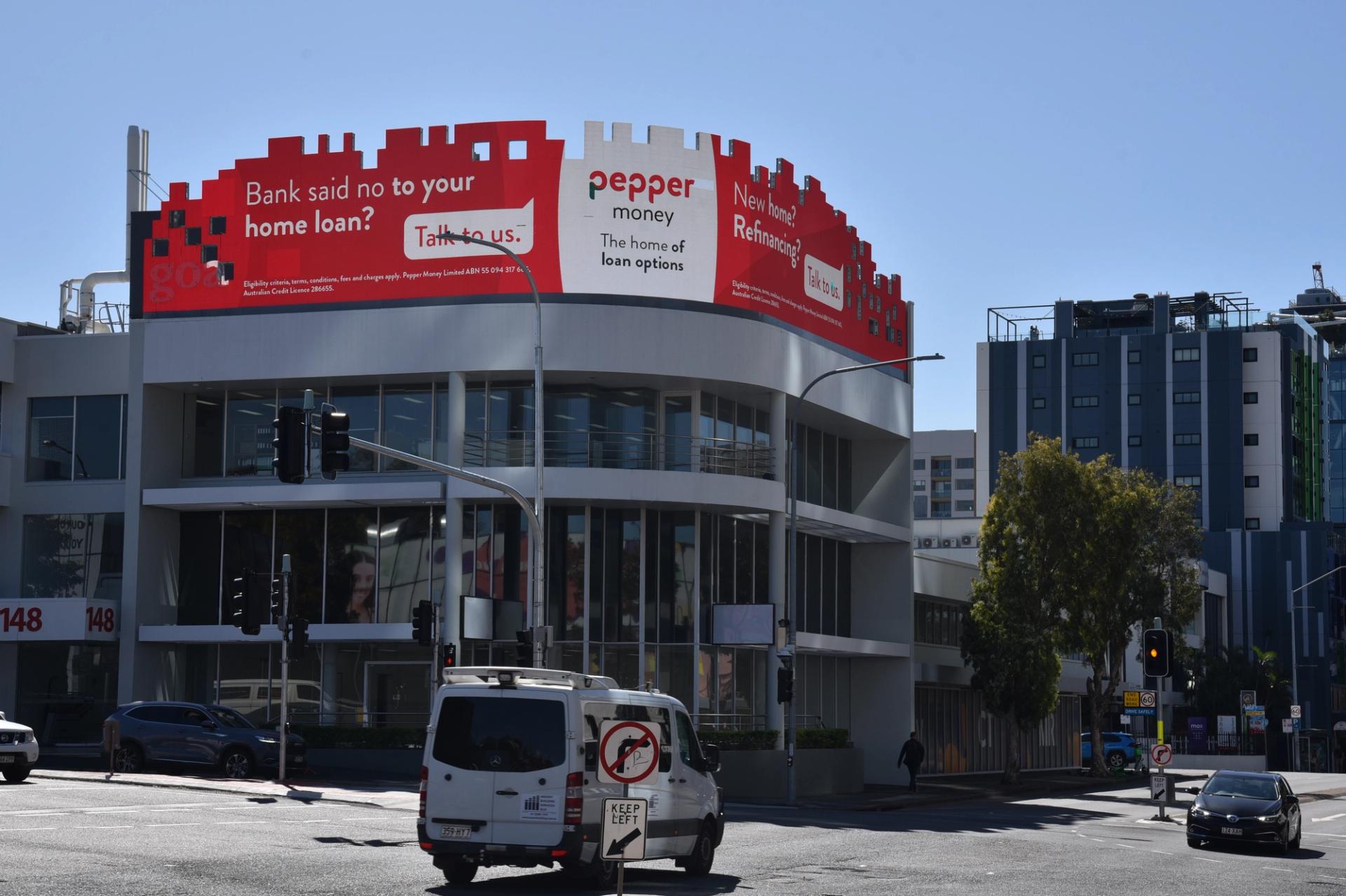 A building with a billboard on top, as part of Pepper Money's multi-channel marketing campaign