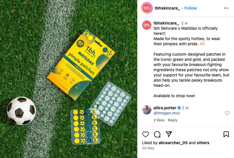 A box of Matilda's limited edition pimple patches from tbh Skincare, placed next to a soccer ball, symbolizing their collaboration with the Australian national women's football team, the Matildas.