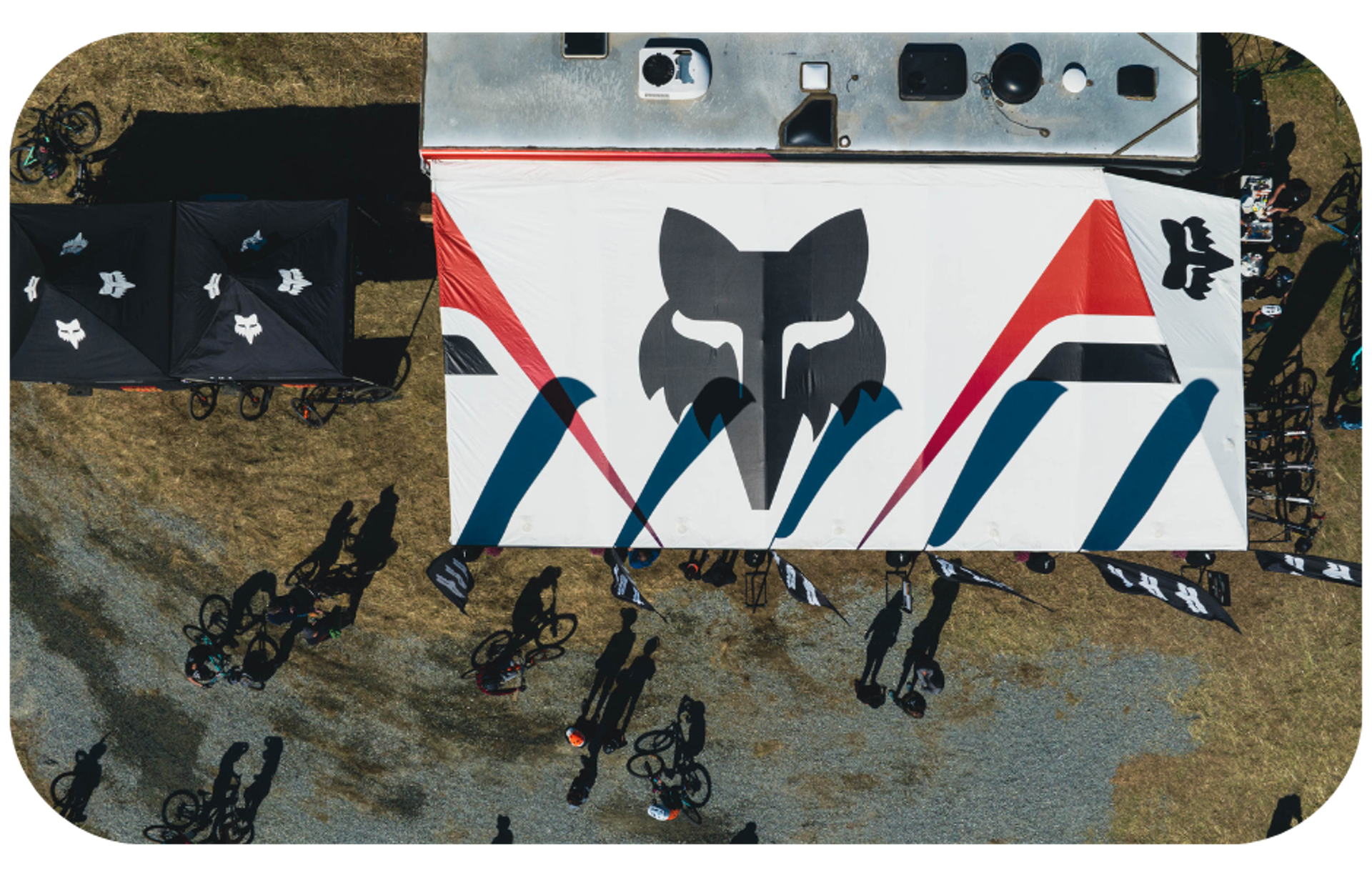 An aerial view of a Fox Racing tent, symbolizing the brand's presence and influence in the ambassador program space