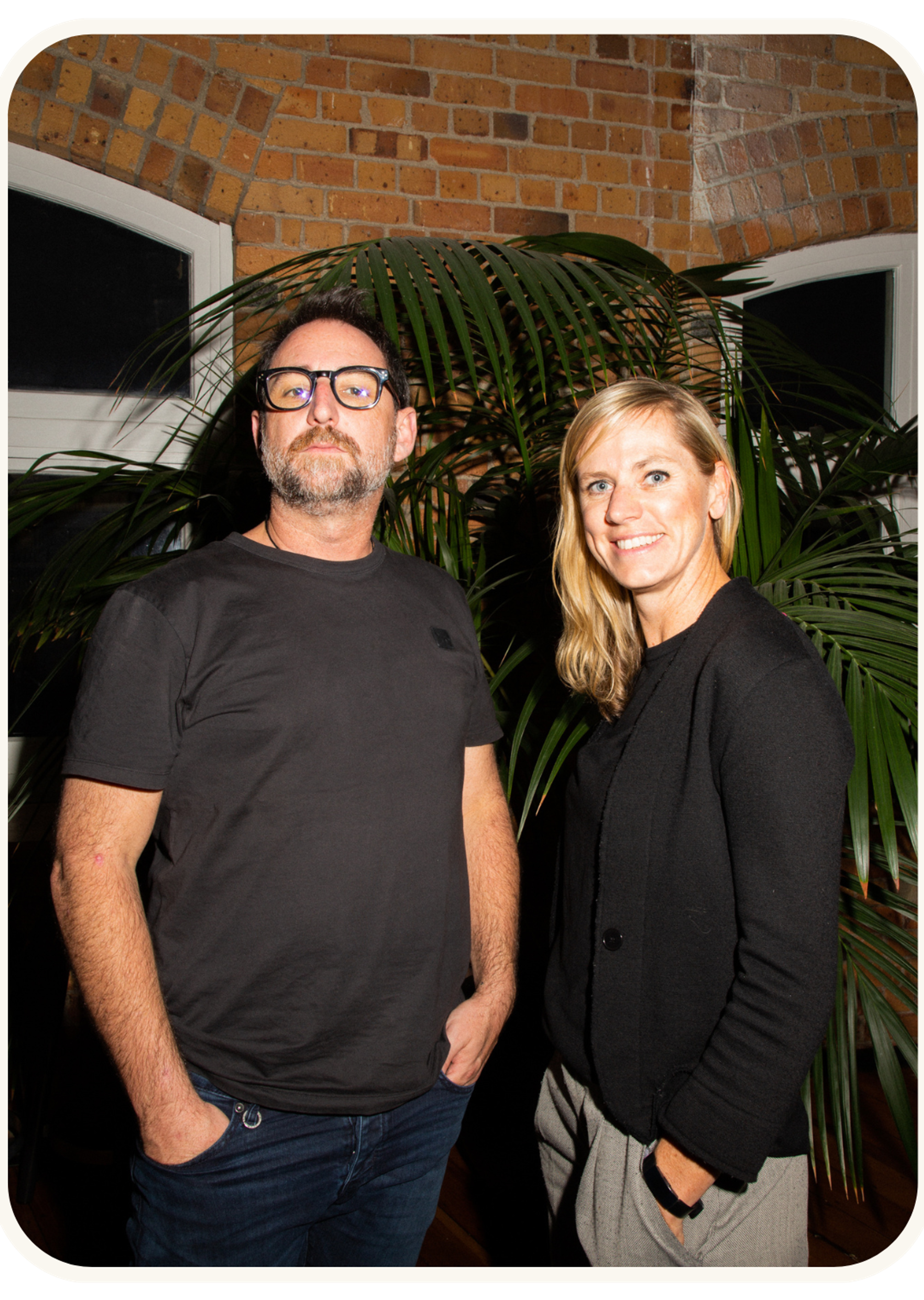 Jemma Whiten, Chief Marketing Officer at solarZero, and a male colleague standing side by side with their hands in their pockets at the Building brands of the future event