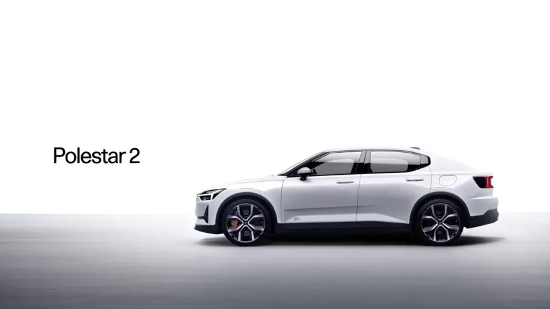 A white Polestar 2 electric vehicle displayed on a white surface, symbolizing the brand's commitment to sustainability and high-performance design.