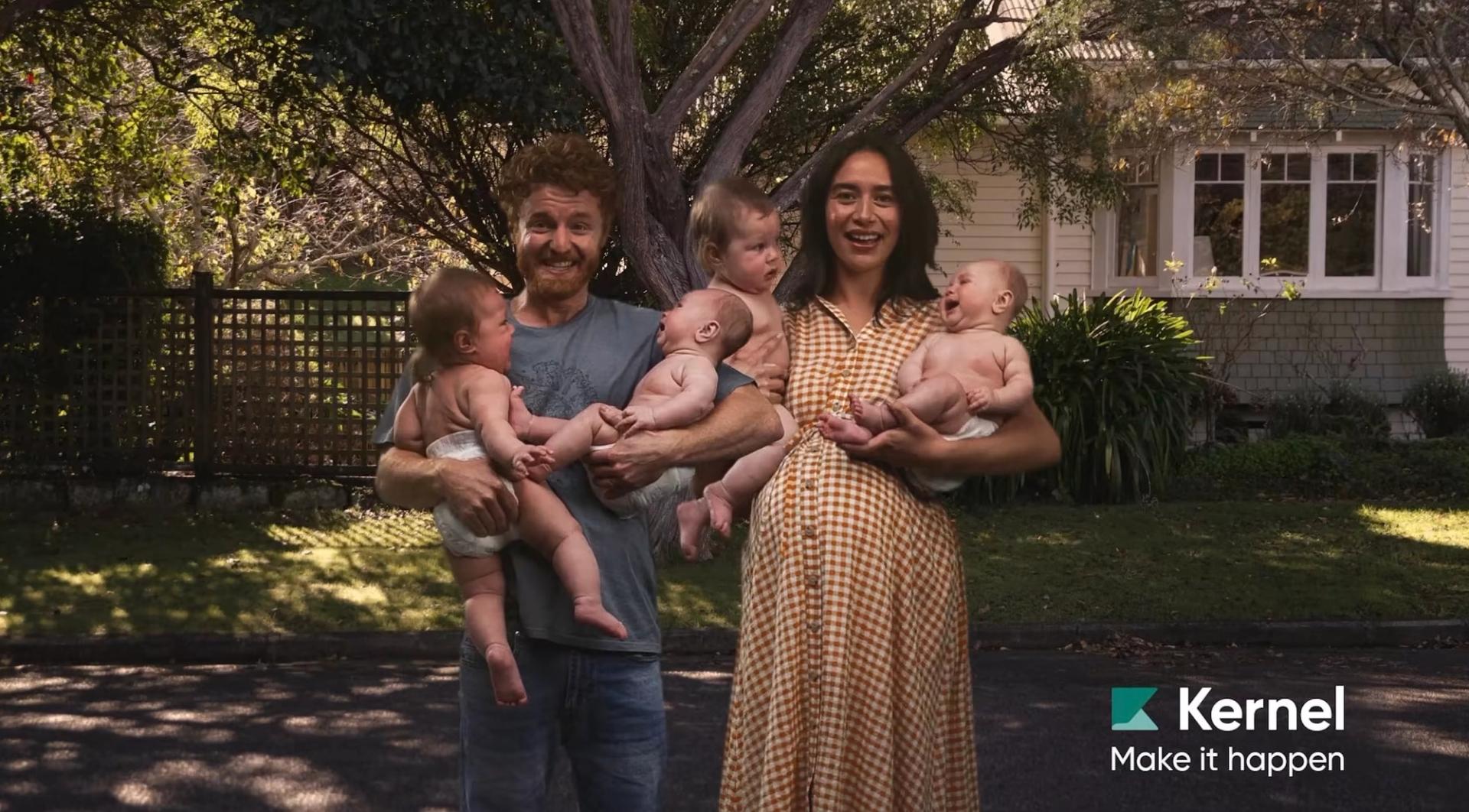 Kernel ad  featuring a man and a woman holding four babies