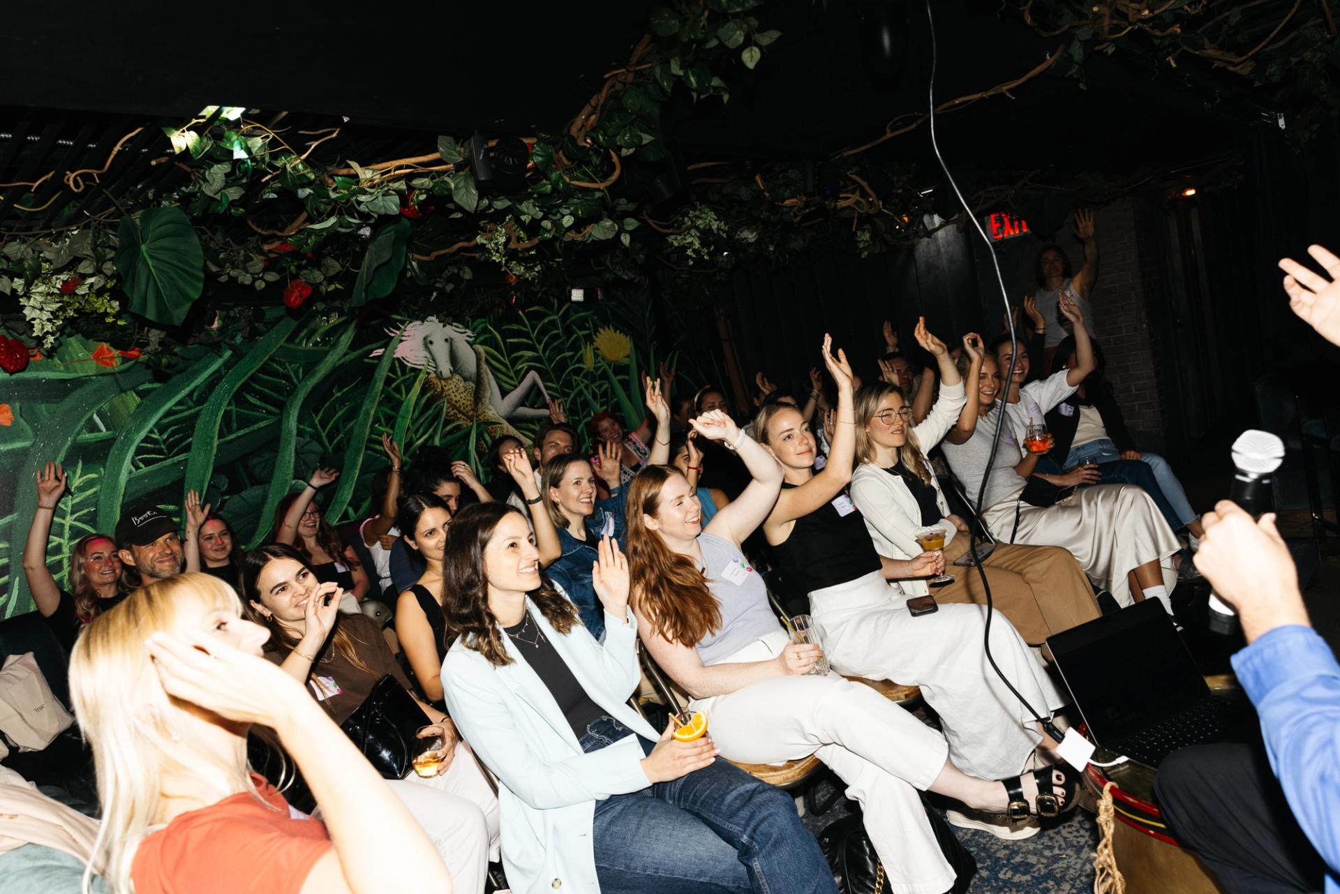 Audience at the Building Brands of the Future event in NYC, actively participating in a discussion about brand and community development strategies