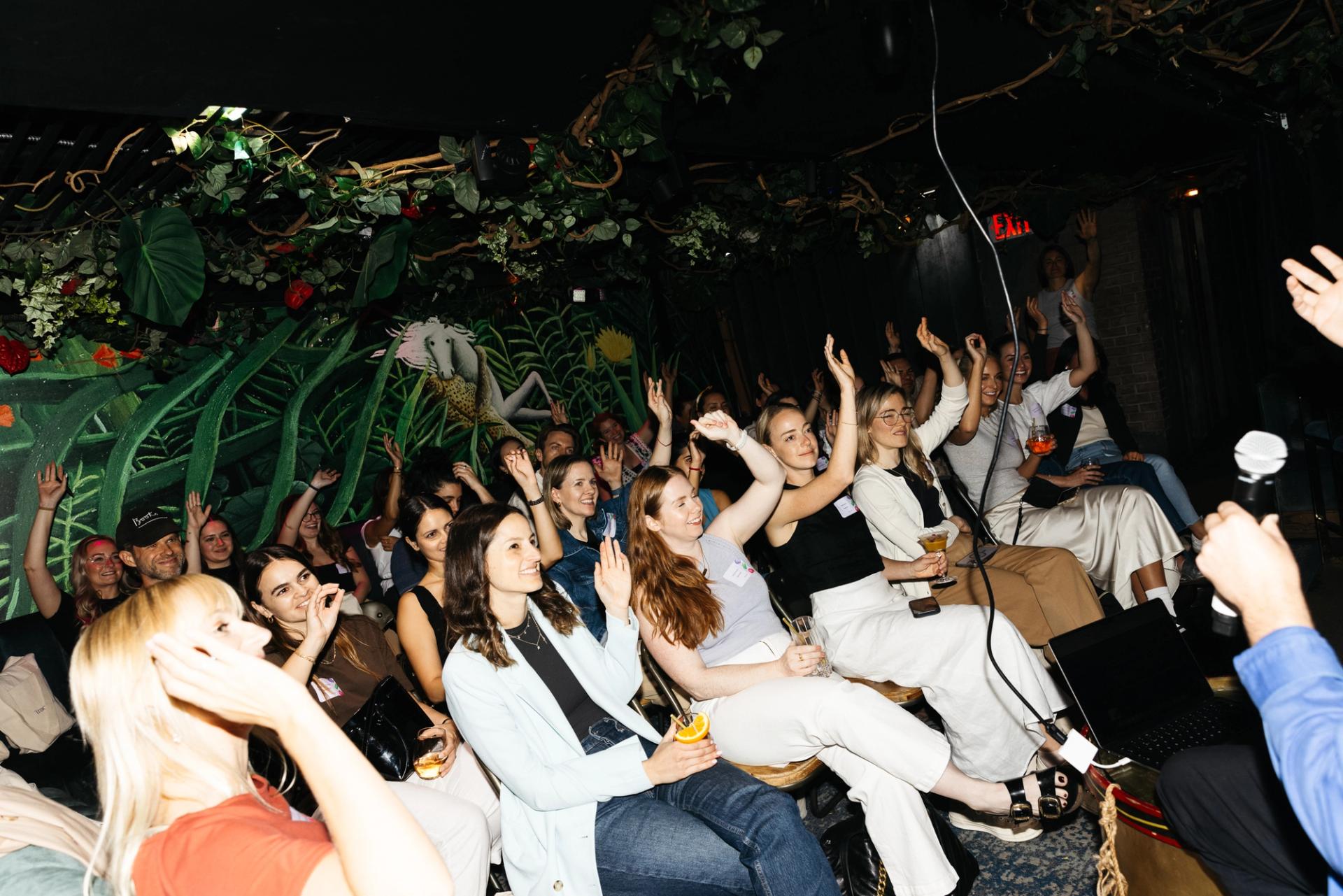 Audience at the Building Brands of the Future event in NYC, actively participating in a discussion about brand and community development strategies