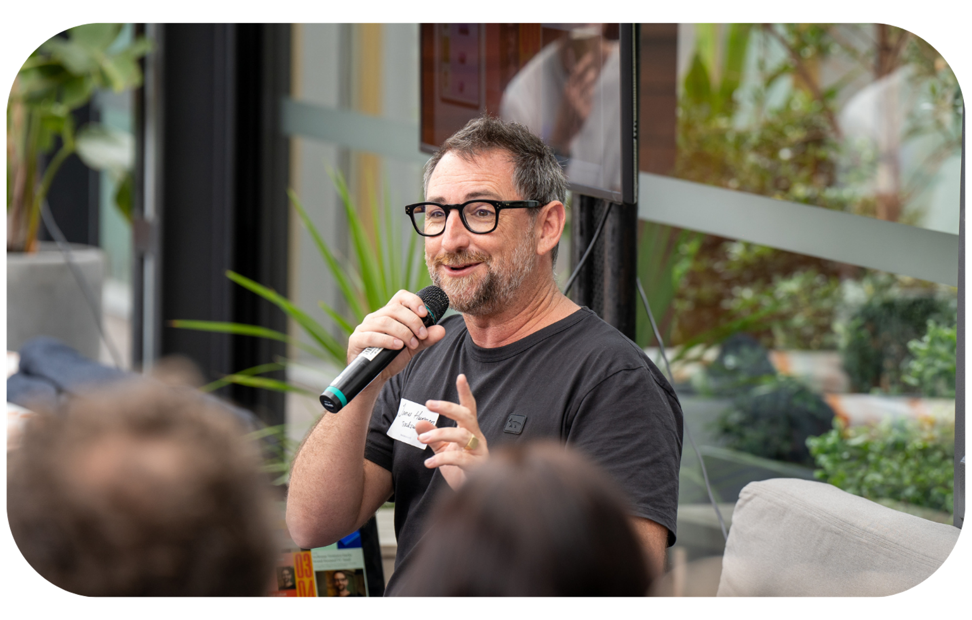 James Hurman speaking to a group of people