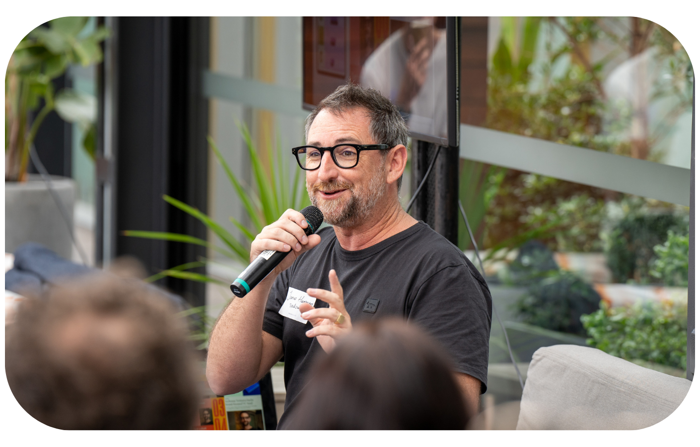 James Hurman speaking to a group of people
