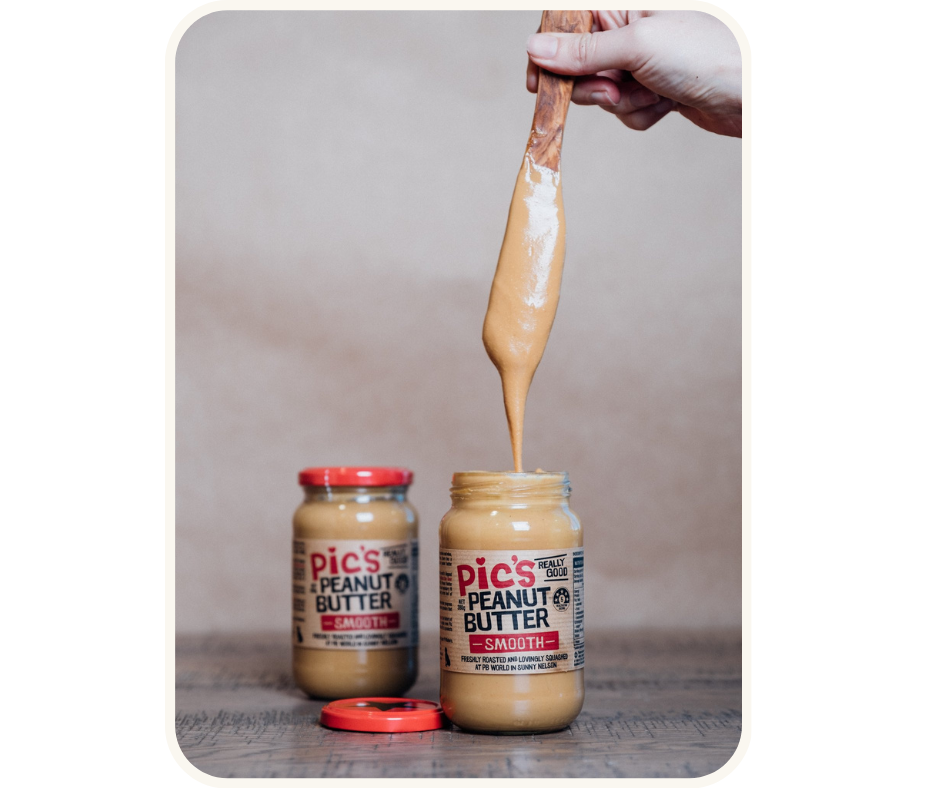 A jar of Pic's Peanut Butter being poured into another jar, representing the brand's dominance in the nut butter category in New Zealand as tracked by MBM agency using the Tracksuit platform.