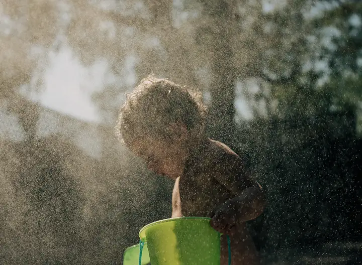 Child playing in yard