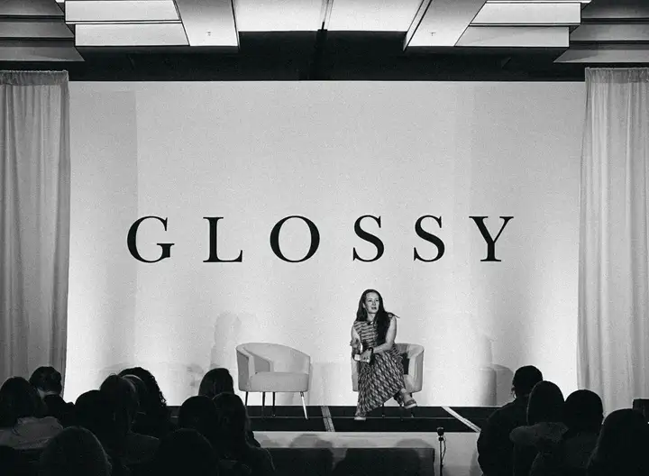 Laura on stage at Glossy
