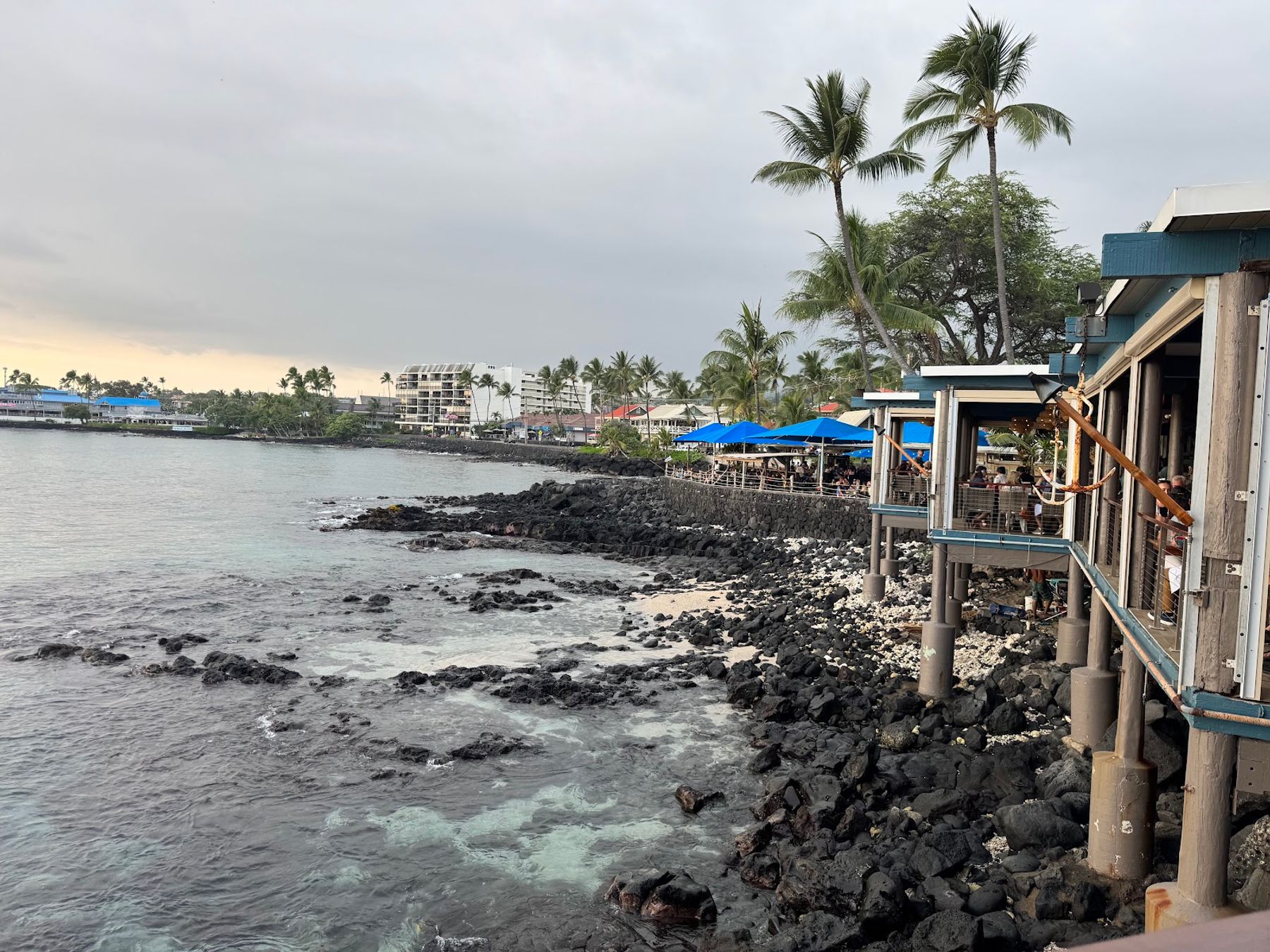Huggo's dining room built over the rocky Kailua-Kona shoreline.