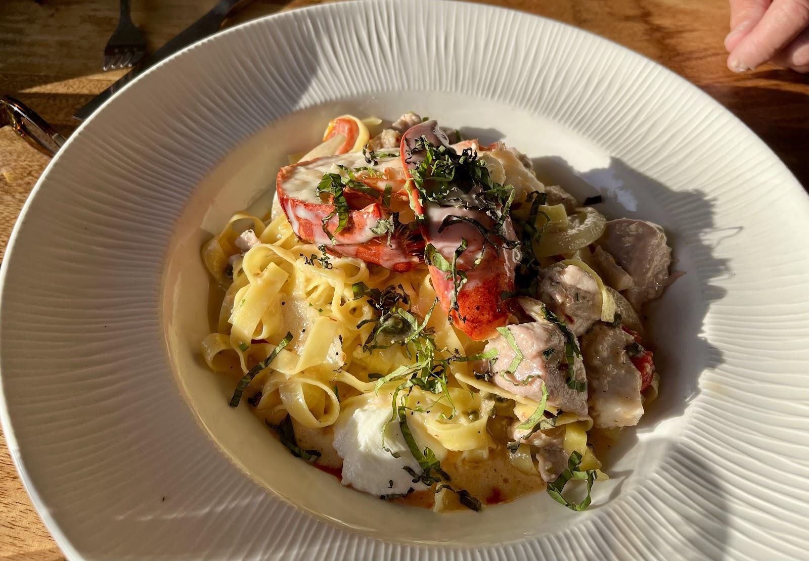 Elegant lobster pasta dish at Beach House Restaurant showcasing Poipu fine dining