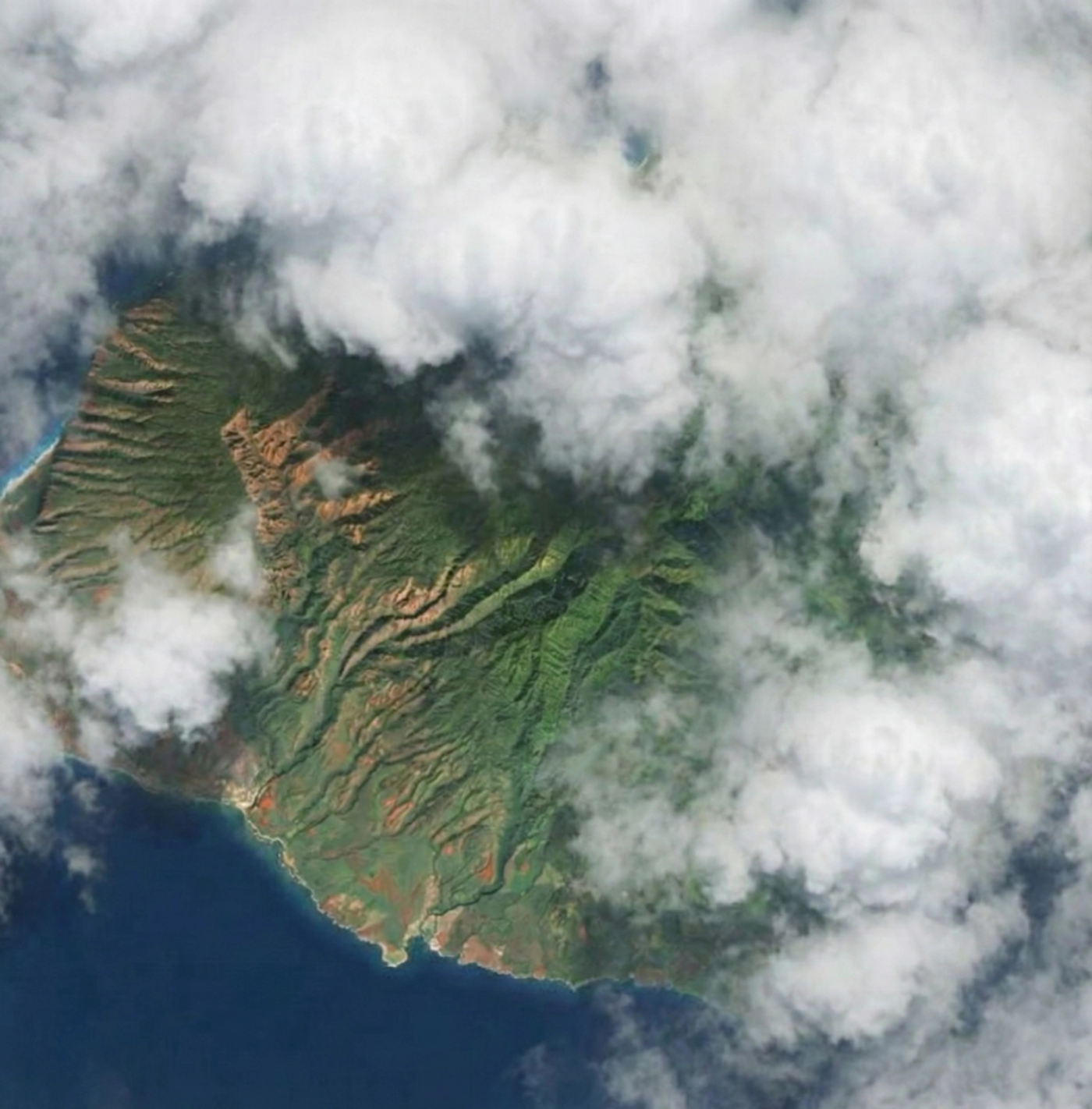satellite view of Kaua'i on a typical rainy season day