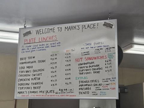 Classic plate lunch menu board at Marks Place featuring local Hawaiian favorites like loco moco and chicken katsu
