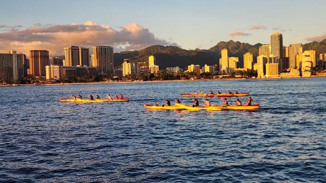 Canoe clubs practicing off Waikiki