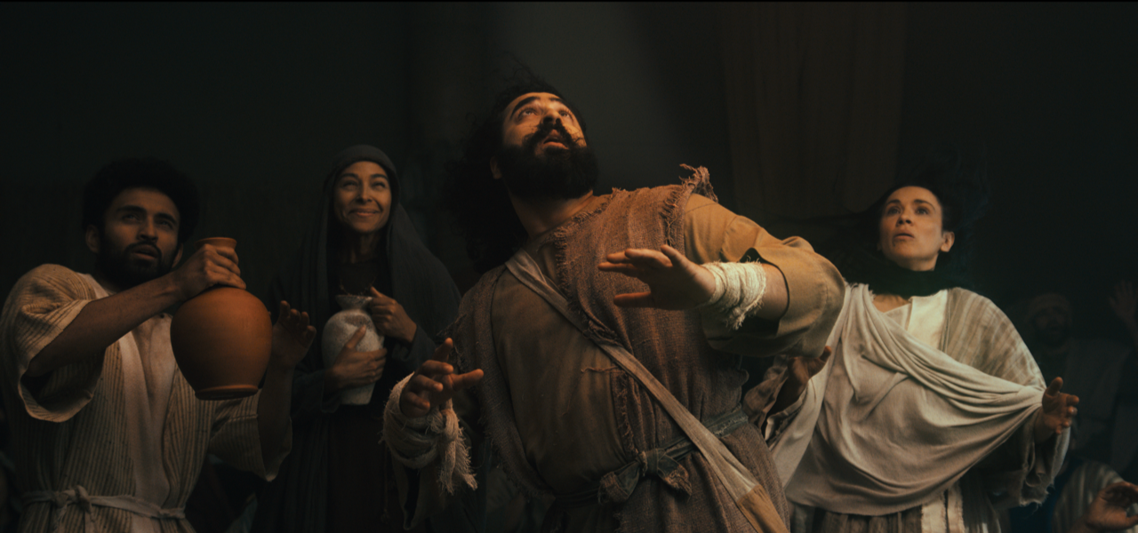 The disciples look upward in wonder as the Spirit falls at Pentecost
