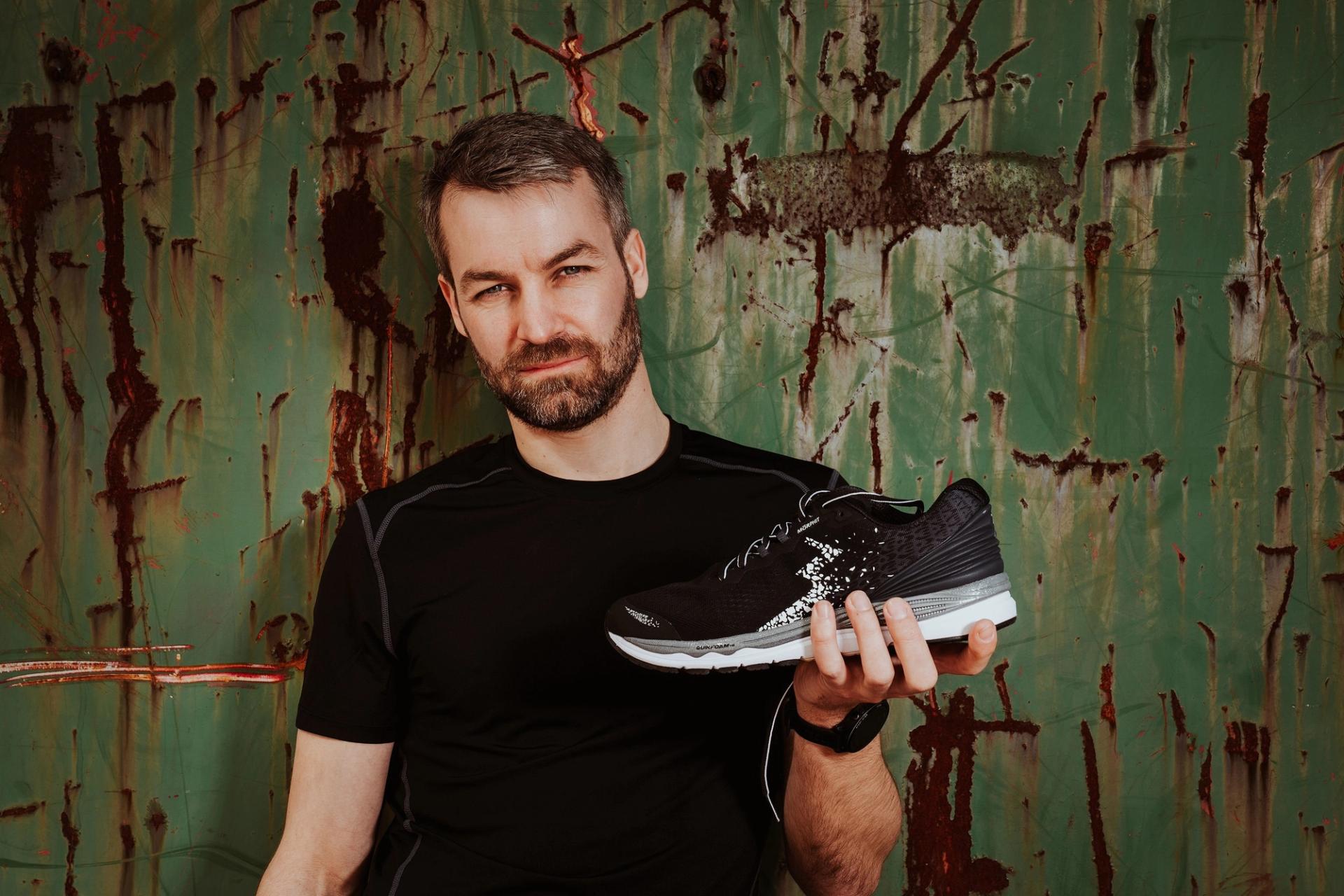 Athlete shoe green wall — Björn Lexius, Hamburg, Germany