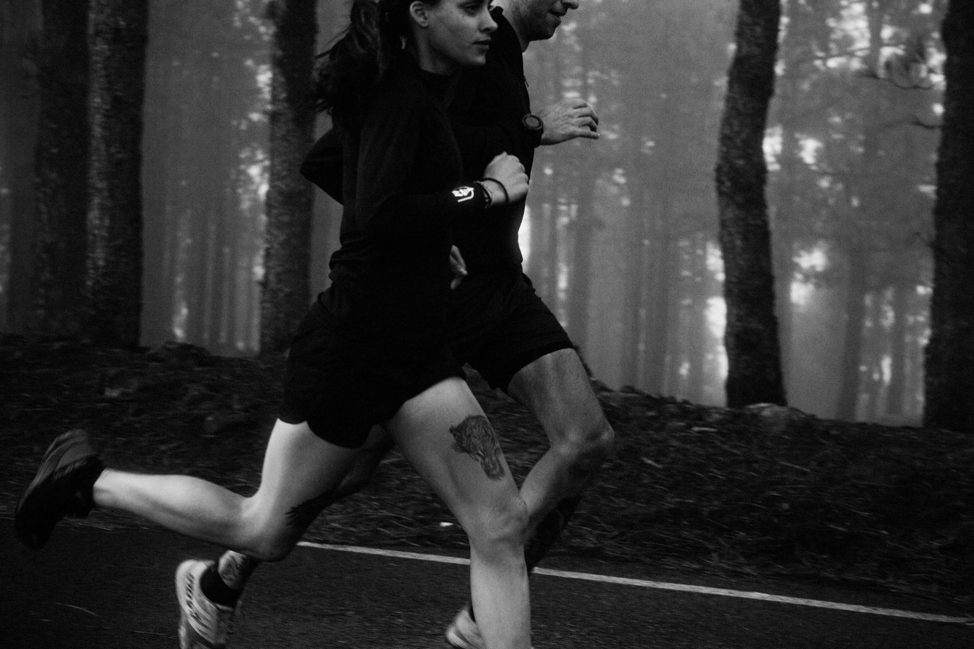 Two runners forest road bw — Björn Lexius, Gran Canaria, Spain