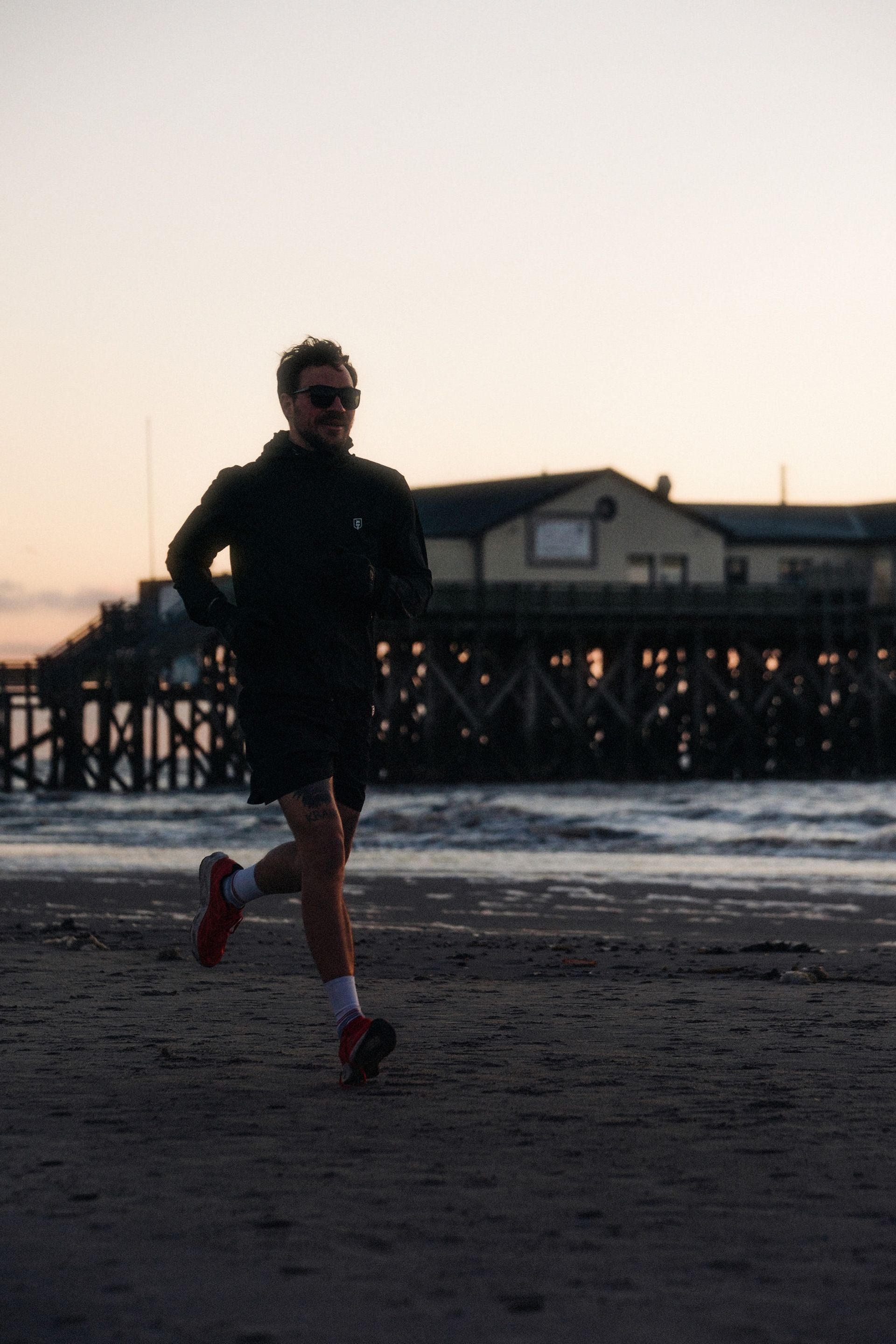Runner pier dusk — Björn Lexius, Sankt Peter-Ording