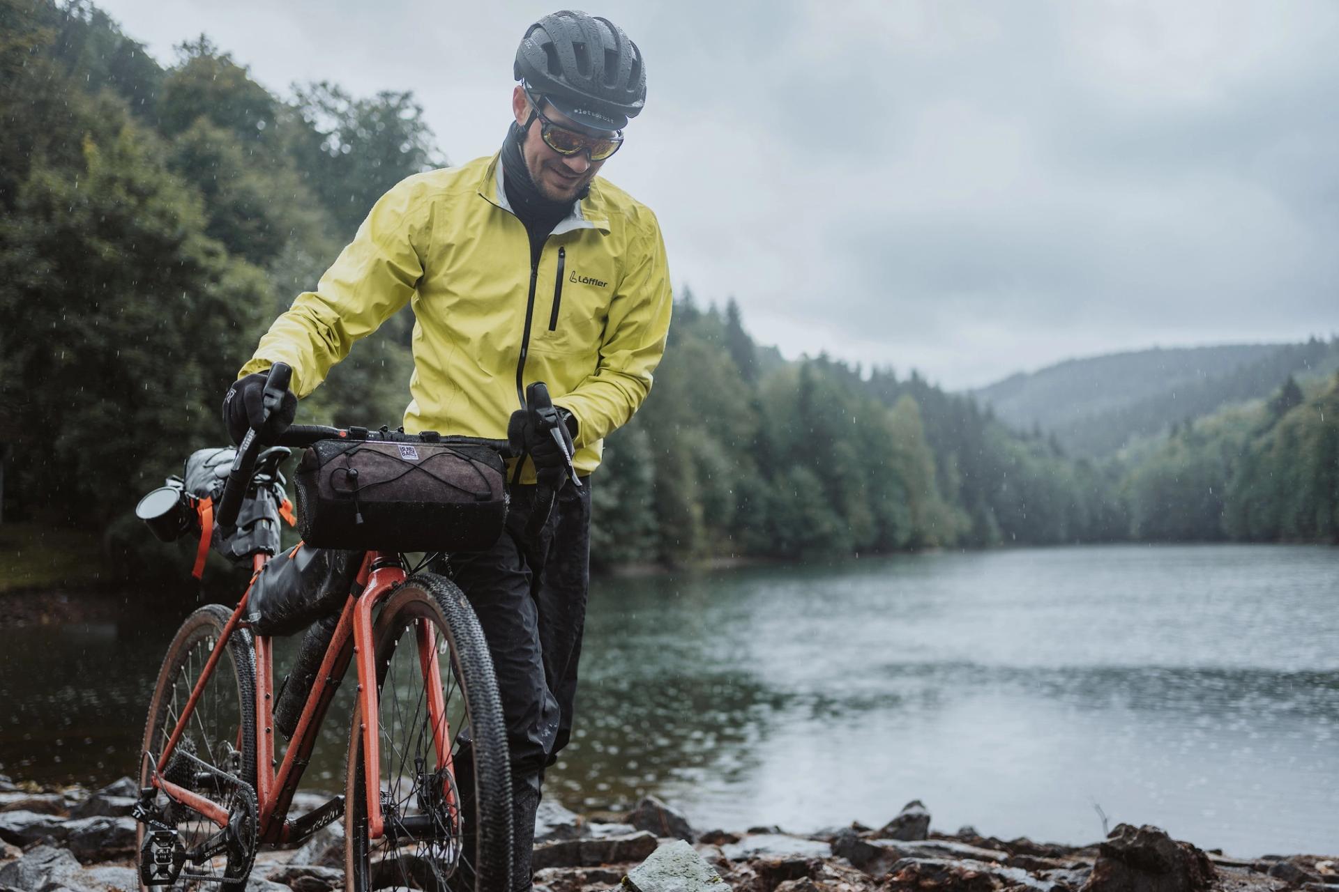 Rider lakeside rain — Björn Lexius, Sauerland, Germany
