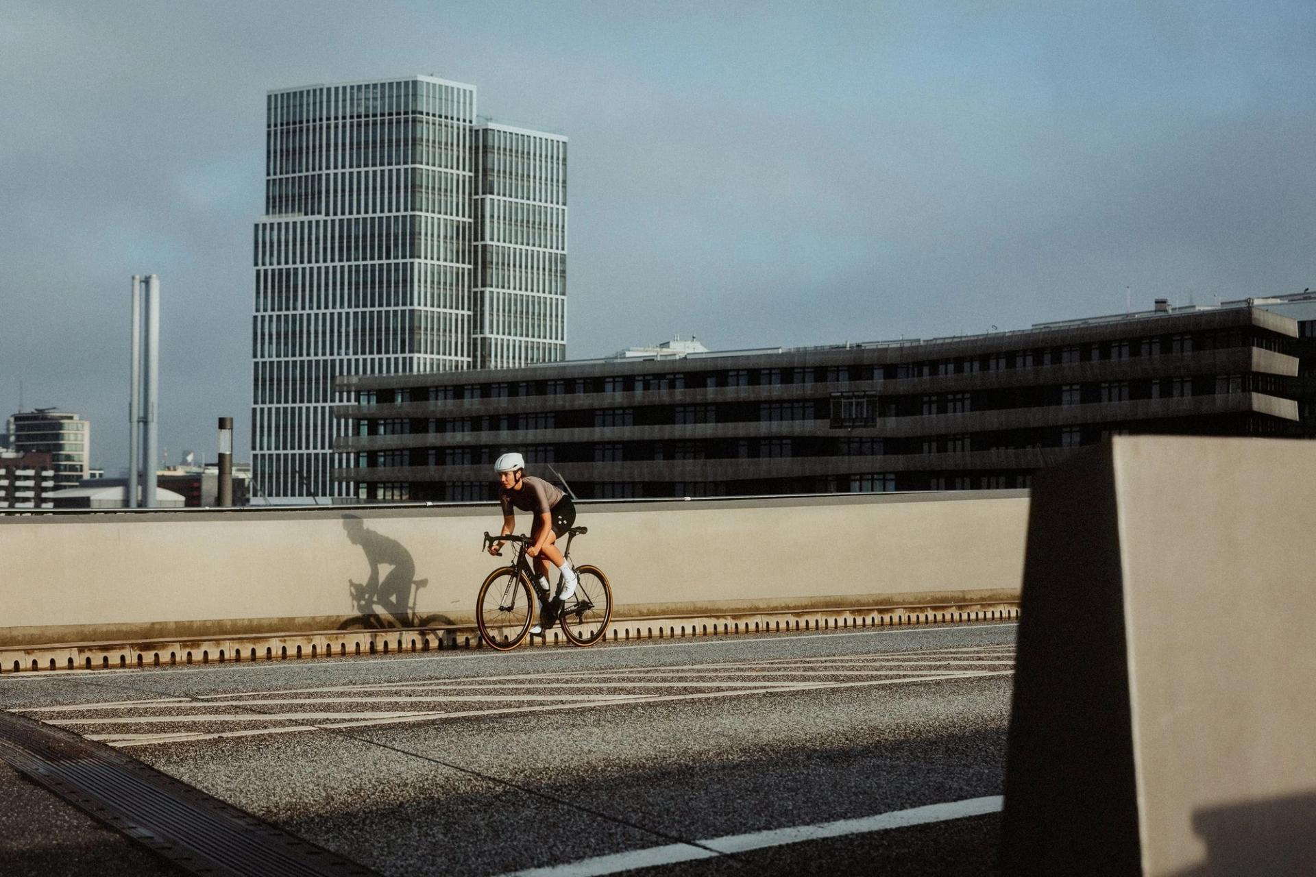 Cyclist rooftop towers — Björn Lexius, Hamburg