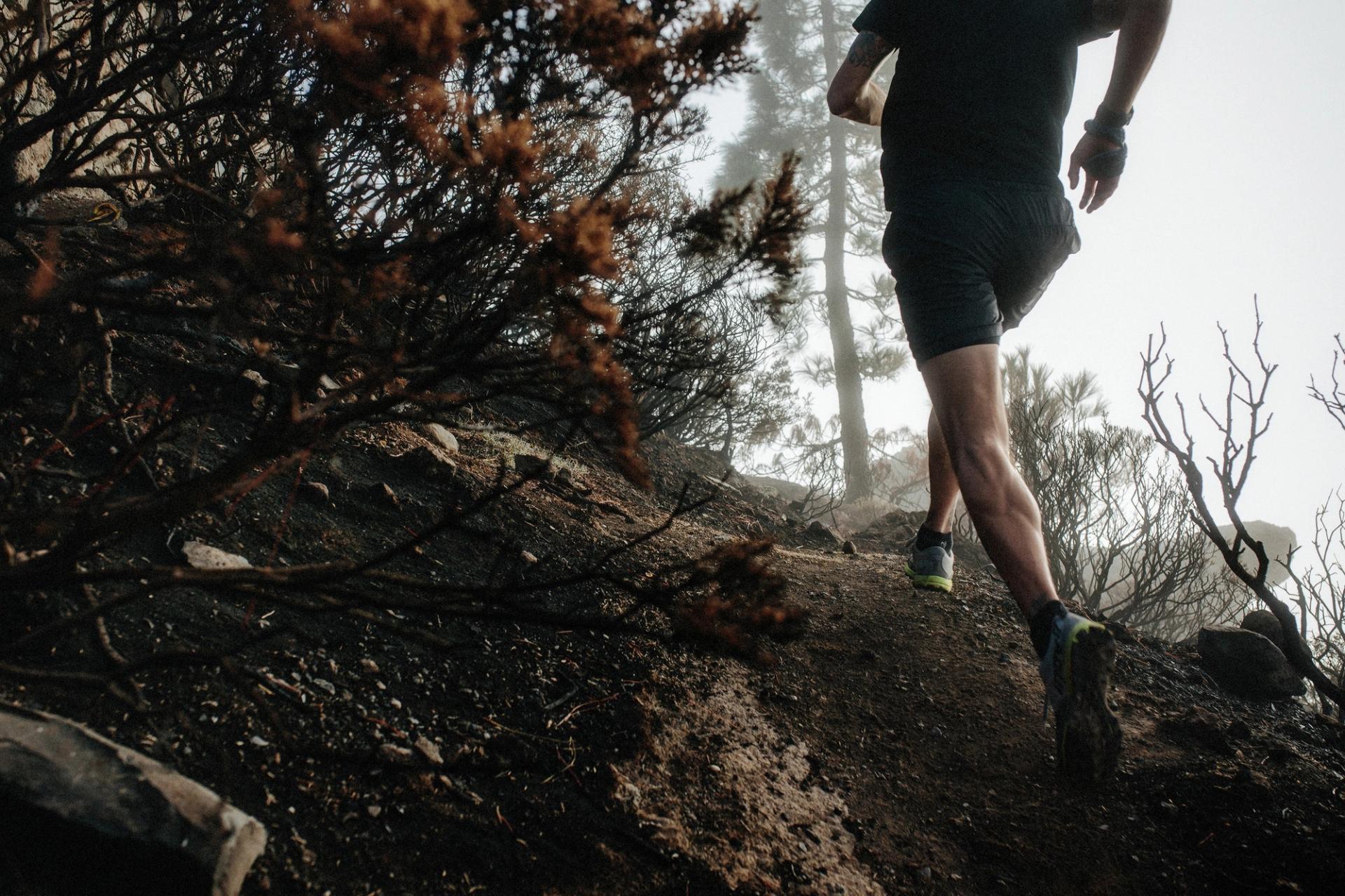 Runner ascending rocky trail — Björn Lexius, Gran Canaria, Spain