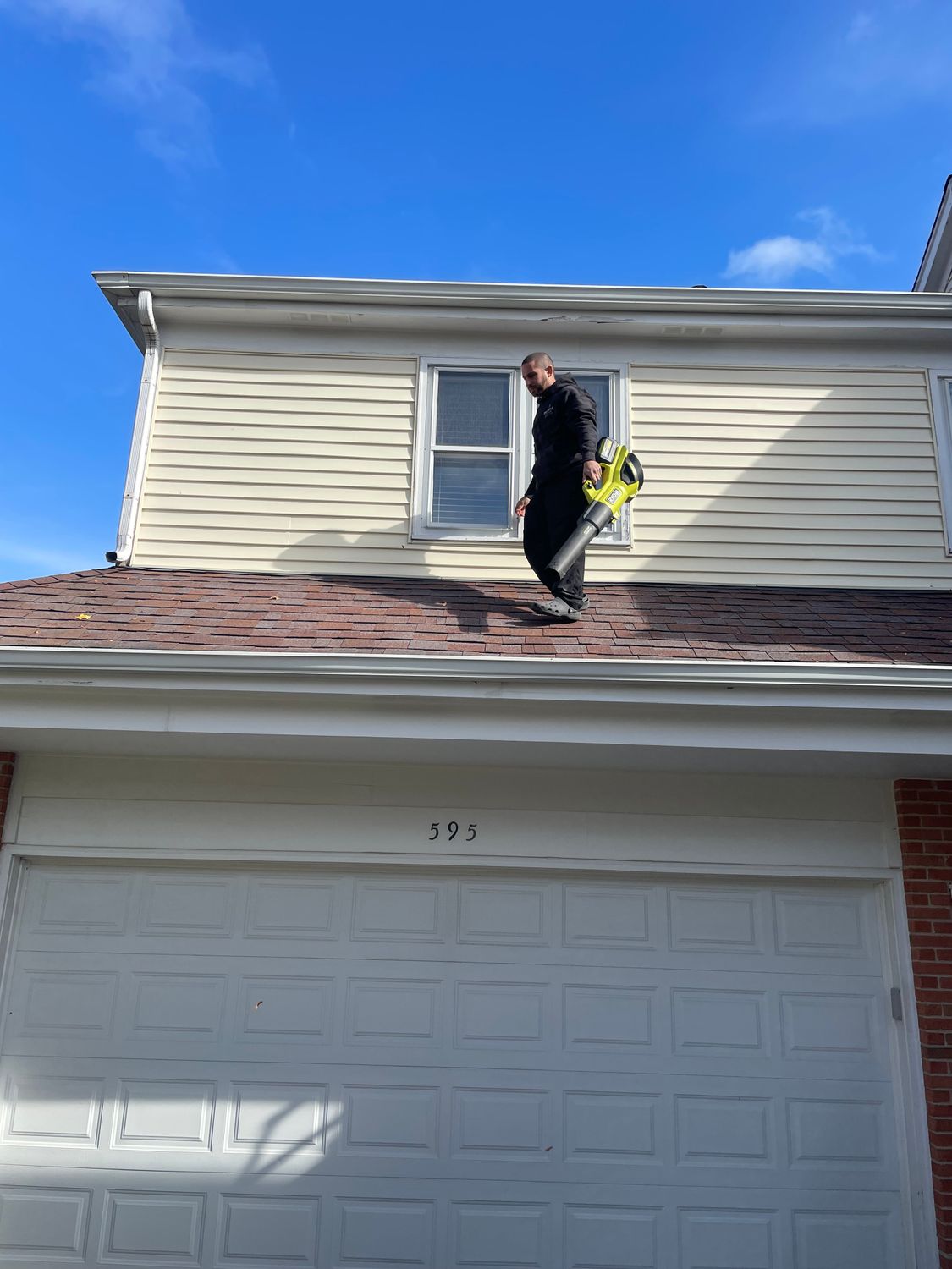 Gutter cleaning in progress