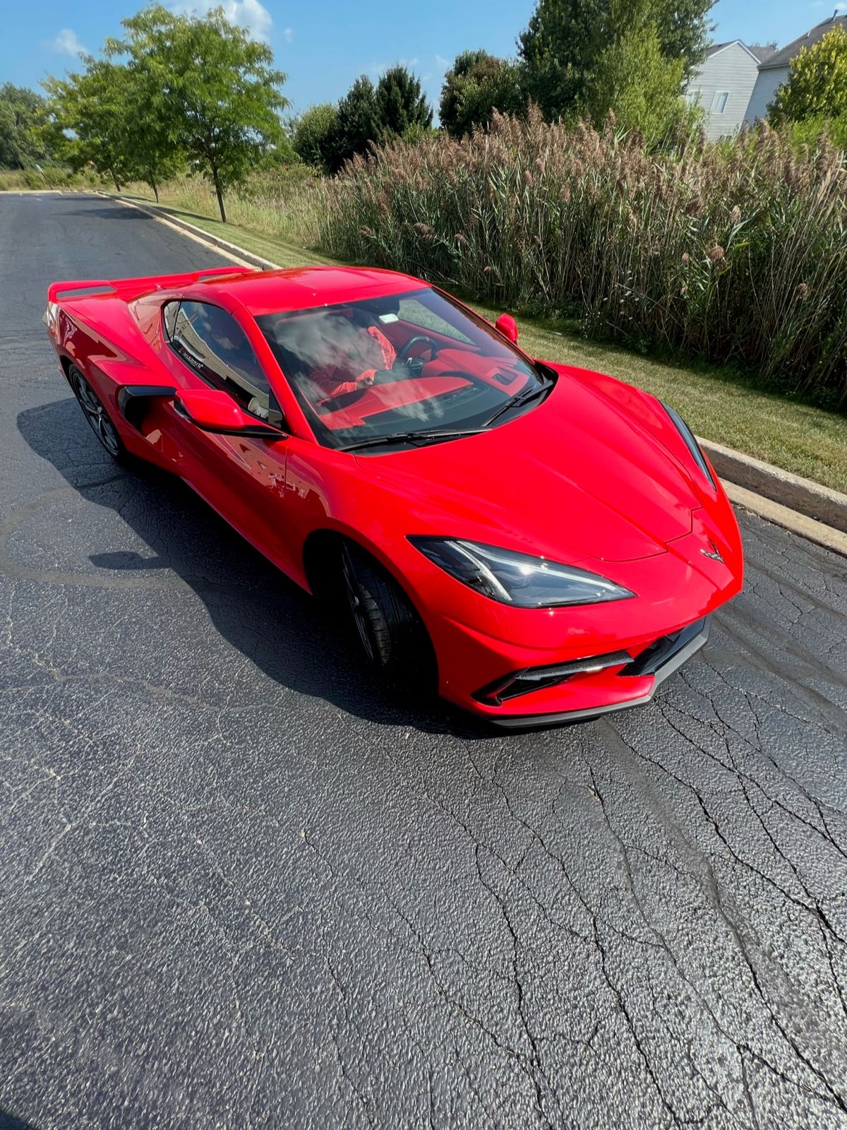 Red C8 Corvette front elevated view after detail