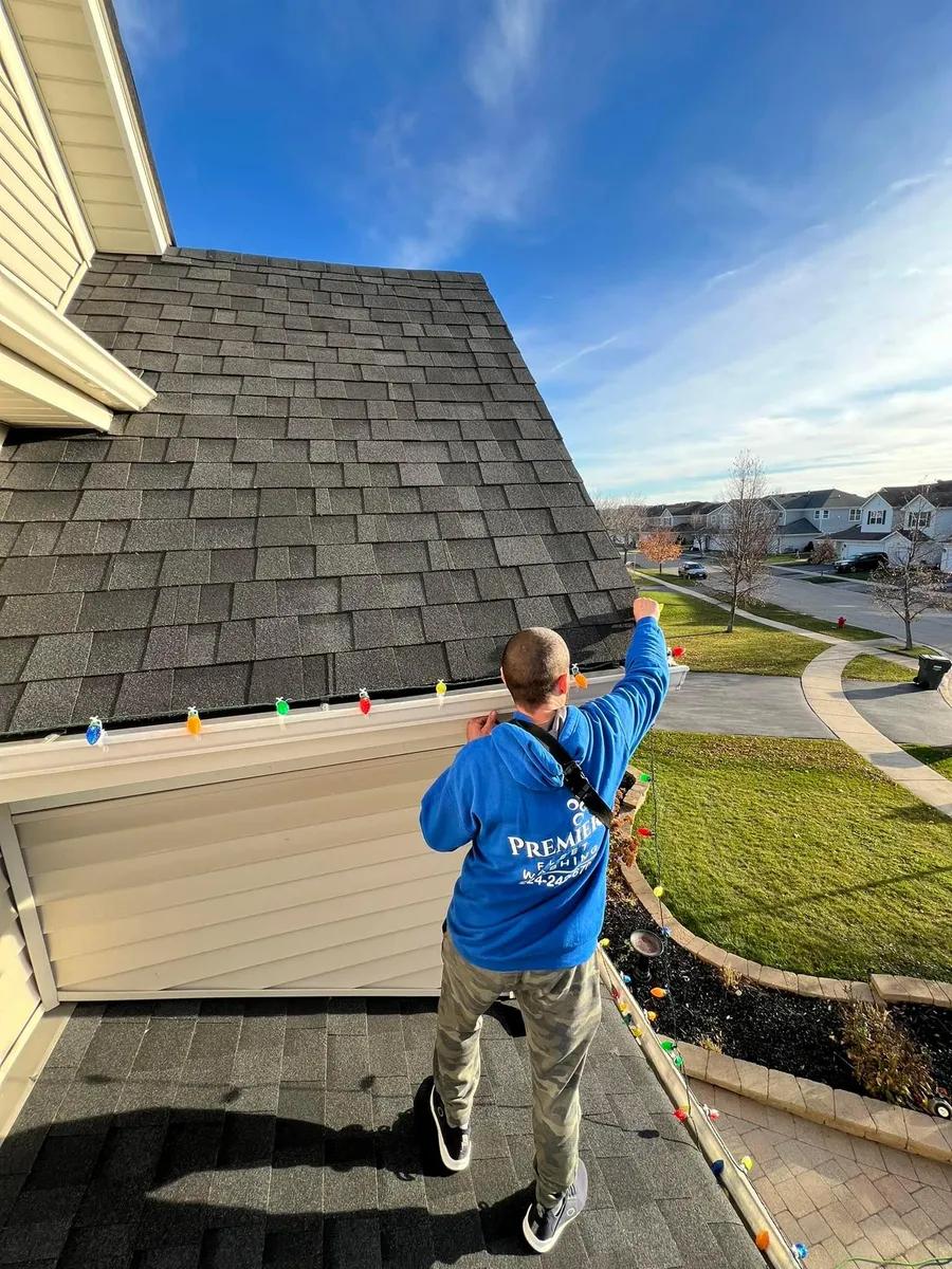 Holiday lighting installation in progress