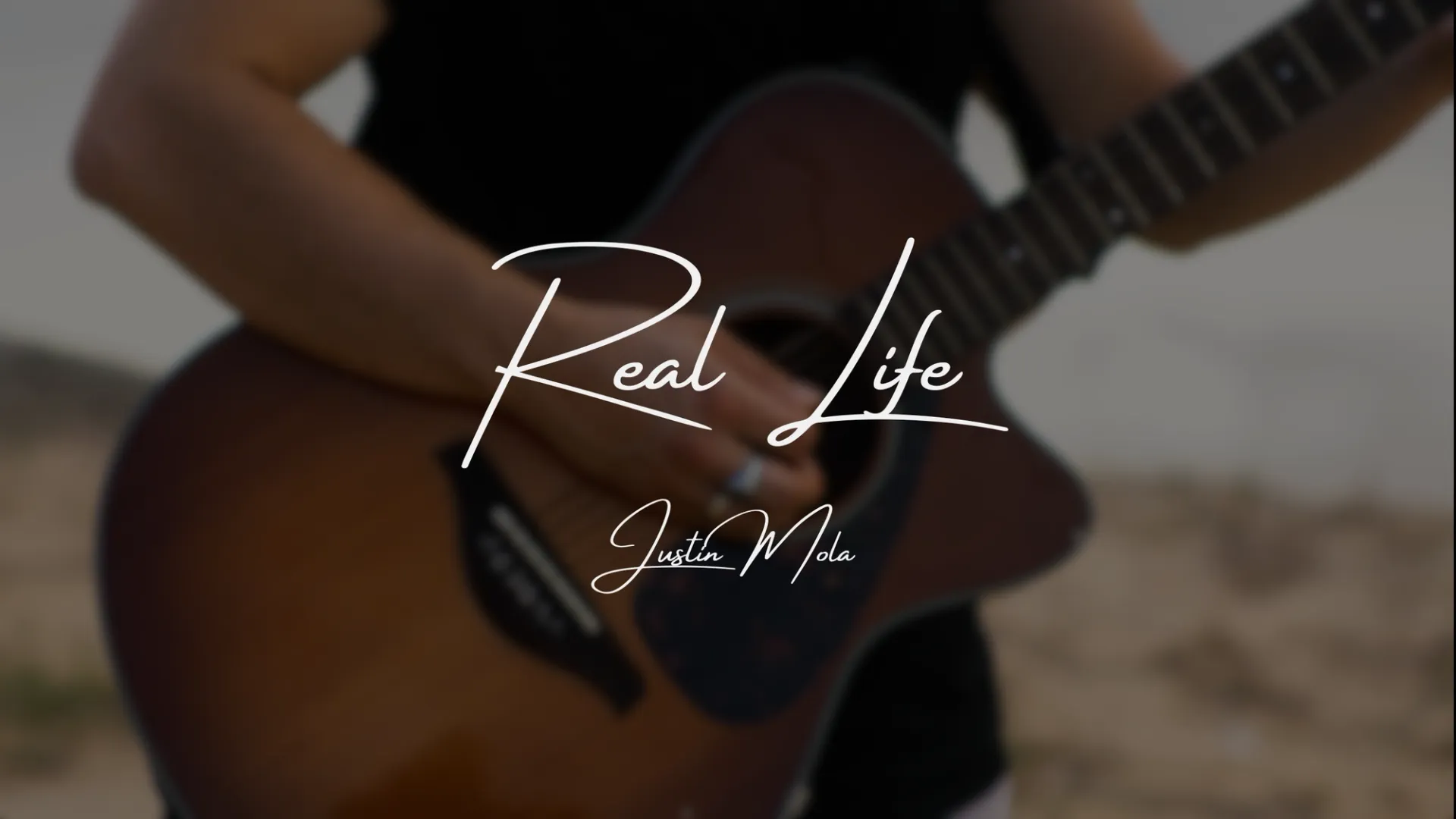 Real Life by Justin Mola