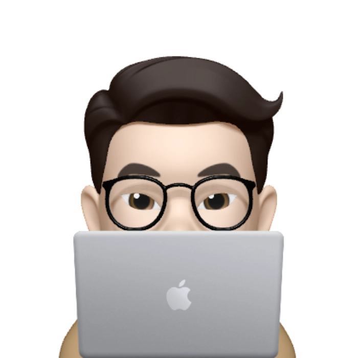 Memoji of portfolio subject working on a Macbook