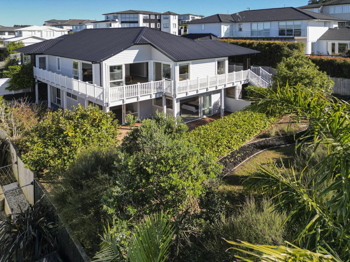 Aerial view of the house and its deck from the rear garden