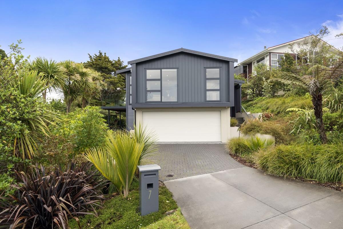 Street frontage with the new garage built in beneath the house