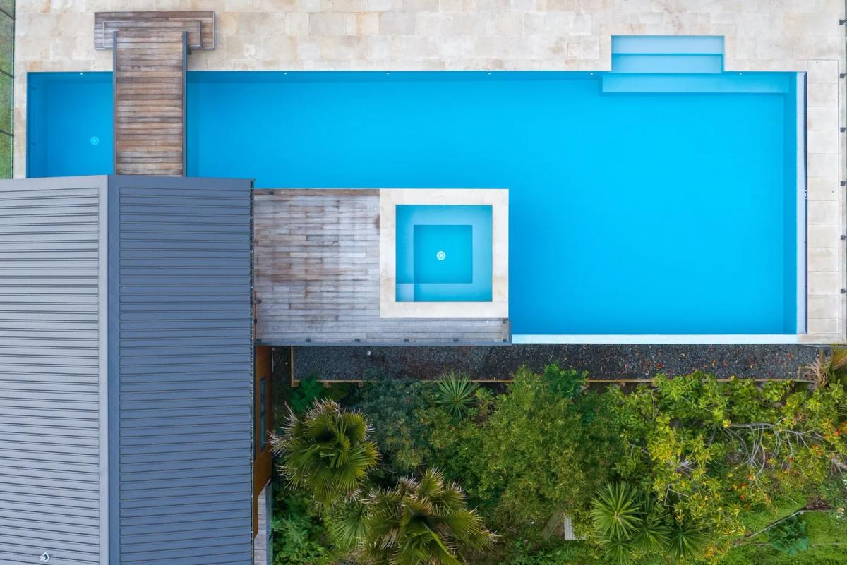 Overhead view of the pool, spa and surrounding deck