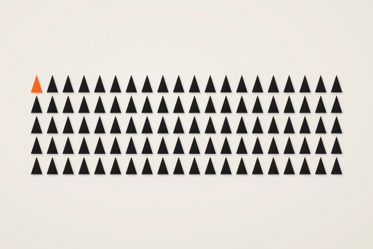 One hundred small dark triangles in five rows on a cream ground; the first one is tangerine, marking the first founding spot claimed.