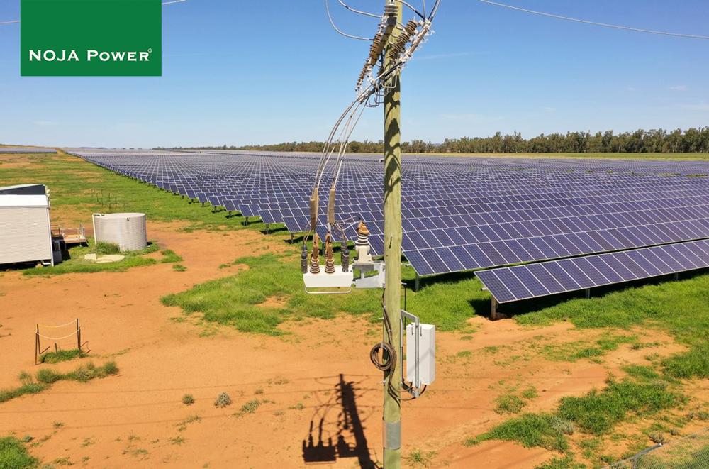 NOJA Power OSM powerline installation in front of solar panel farm in NSW 