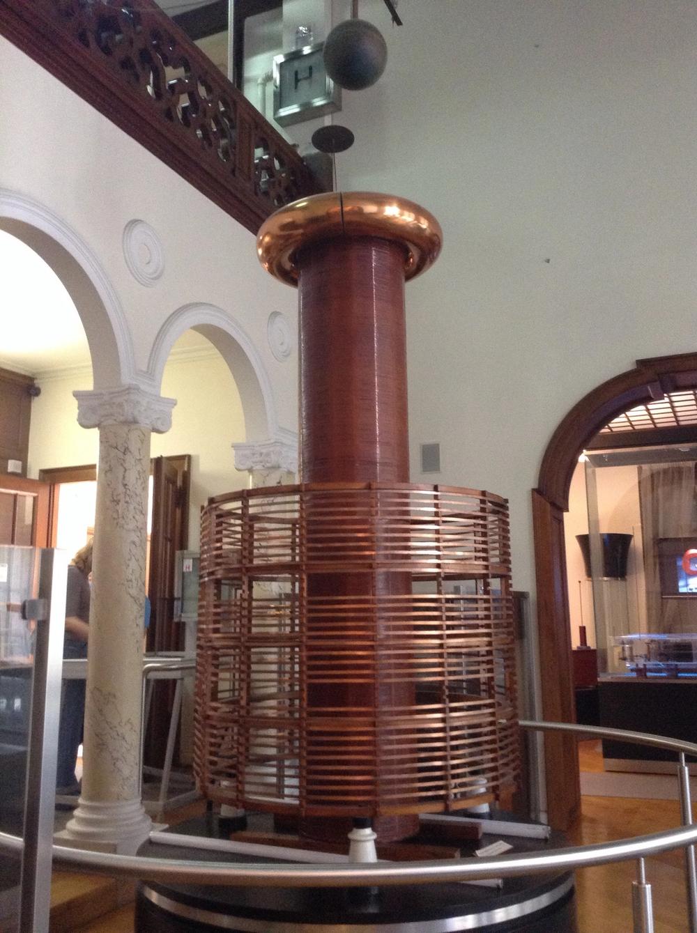 Large rounded copper coil artefact from Tesla