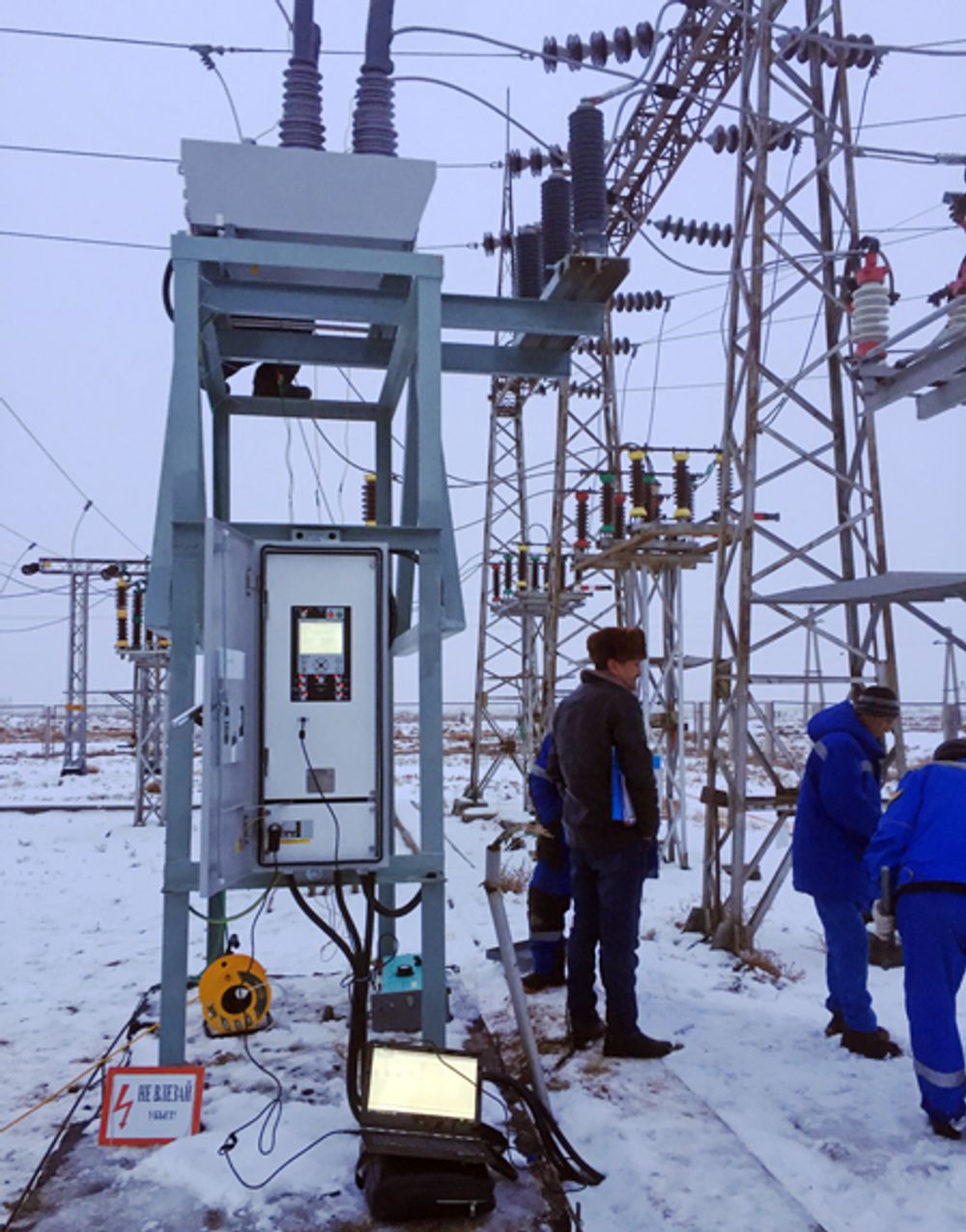 NOJA Power OSM Recloser and RC Controller in substation control system in Kazakhstan, surrounded by snow