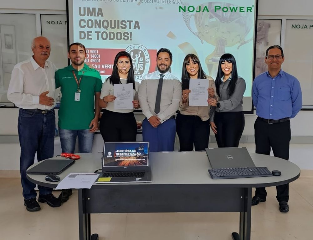 NOJA Power Brazil’s Quality Team celebrate their certification with NPB CEO Bruno Kimura (center)