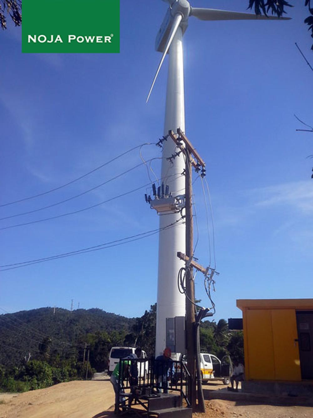 NOJA Power Recloser Installation front of wind turbine in Philippines 