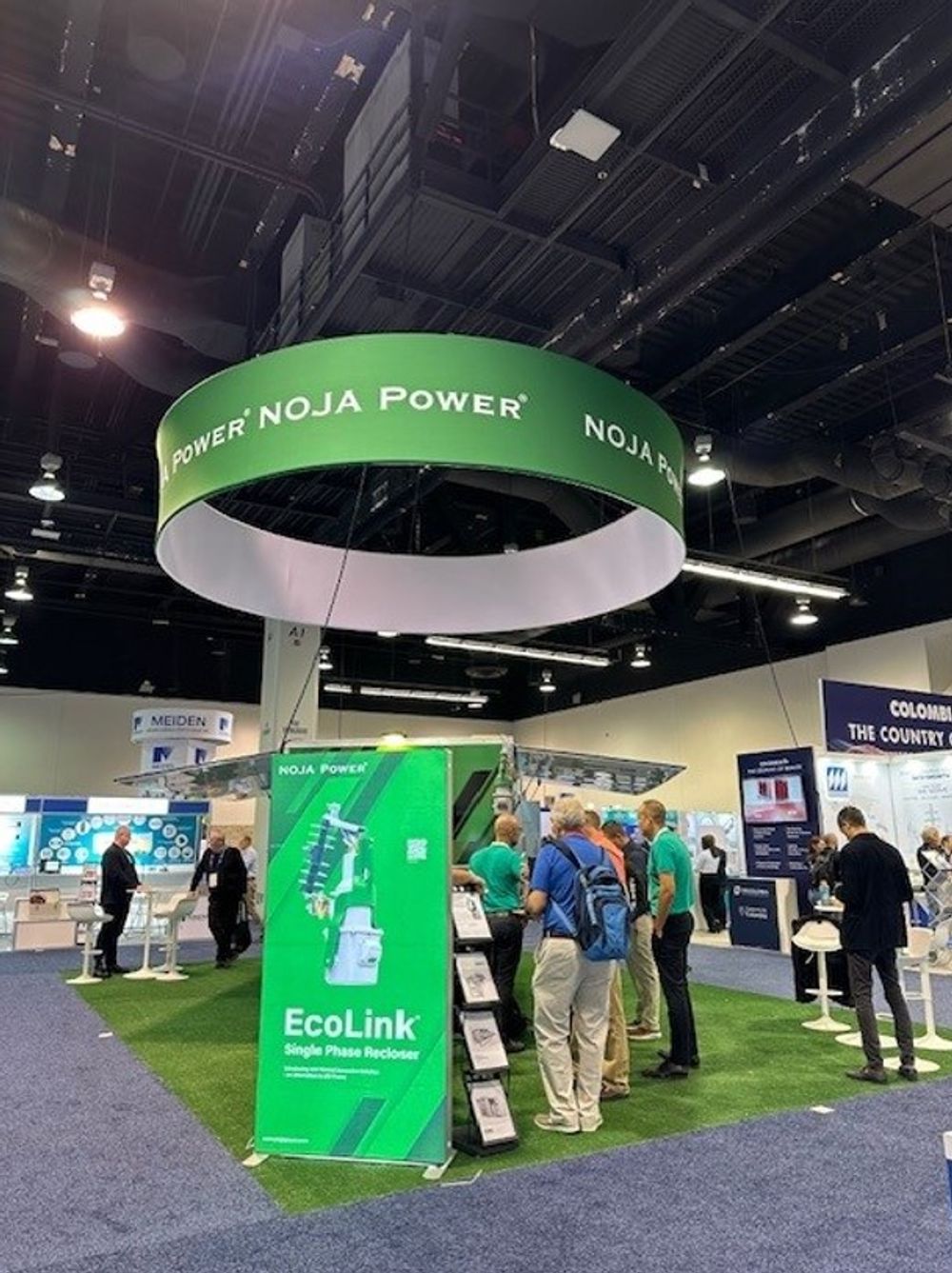 Delegates inspect the NOJA Power EcoLink® at the 2024 IEEE Transmission and Distribution event in Anaheim, California USA.