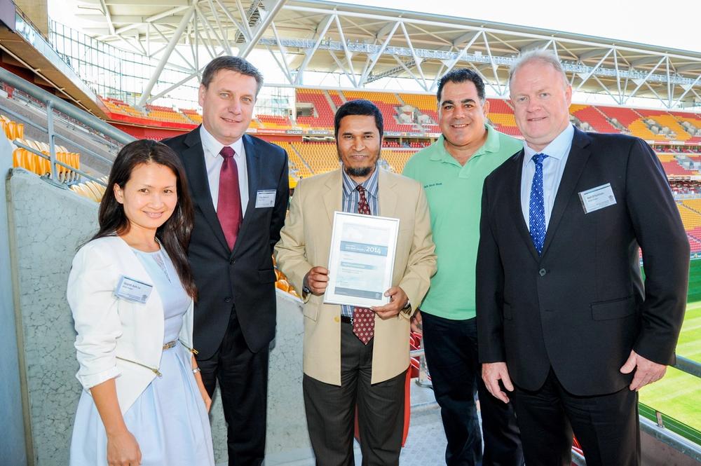 NOJA Power Directors Quynh Anh Le and Oleg Samarski (first and second left) join Managing Director Neil O’Sullivan (far right), QHSE Manager Dr. Rabiul Alam (Centre) and Queensland State of Origin rugby league Coach and Safety Ambassador Mal Meninga in celebrating the company’s Safe Work Award.